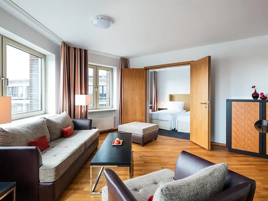 Living room, Bed in Main Plaza Suite Tower