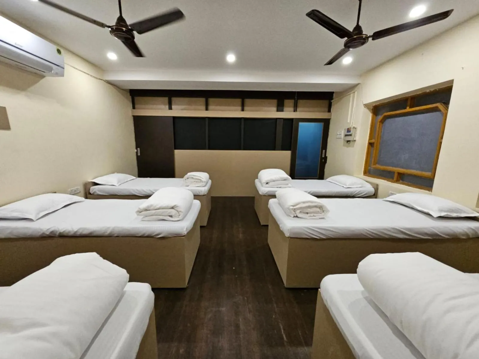 Photo of the whole room, Bed in Hotel Padmini International- Sigra