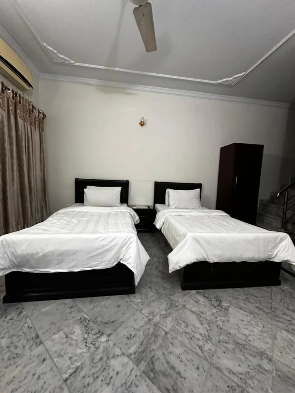 Bed in AK Rezidor Guest House