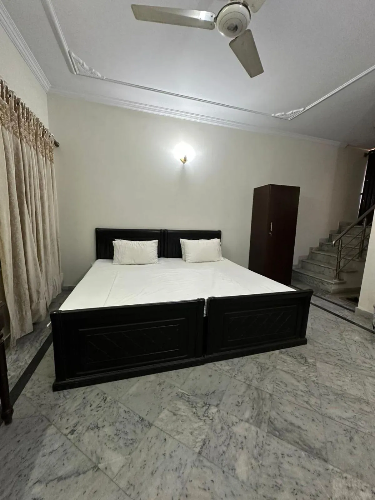 Bed in AK Rezidor Guest House