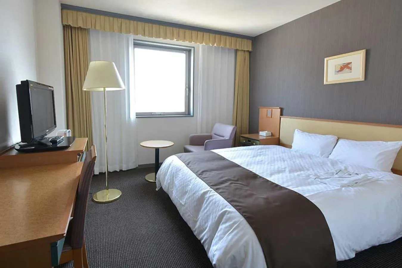 Photo of the whole room, Bed in Blossom Hotel Hirosaki