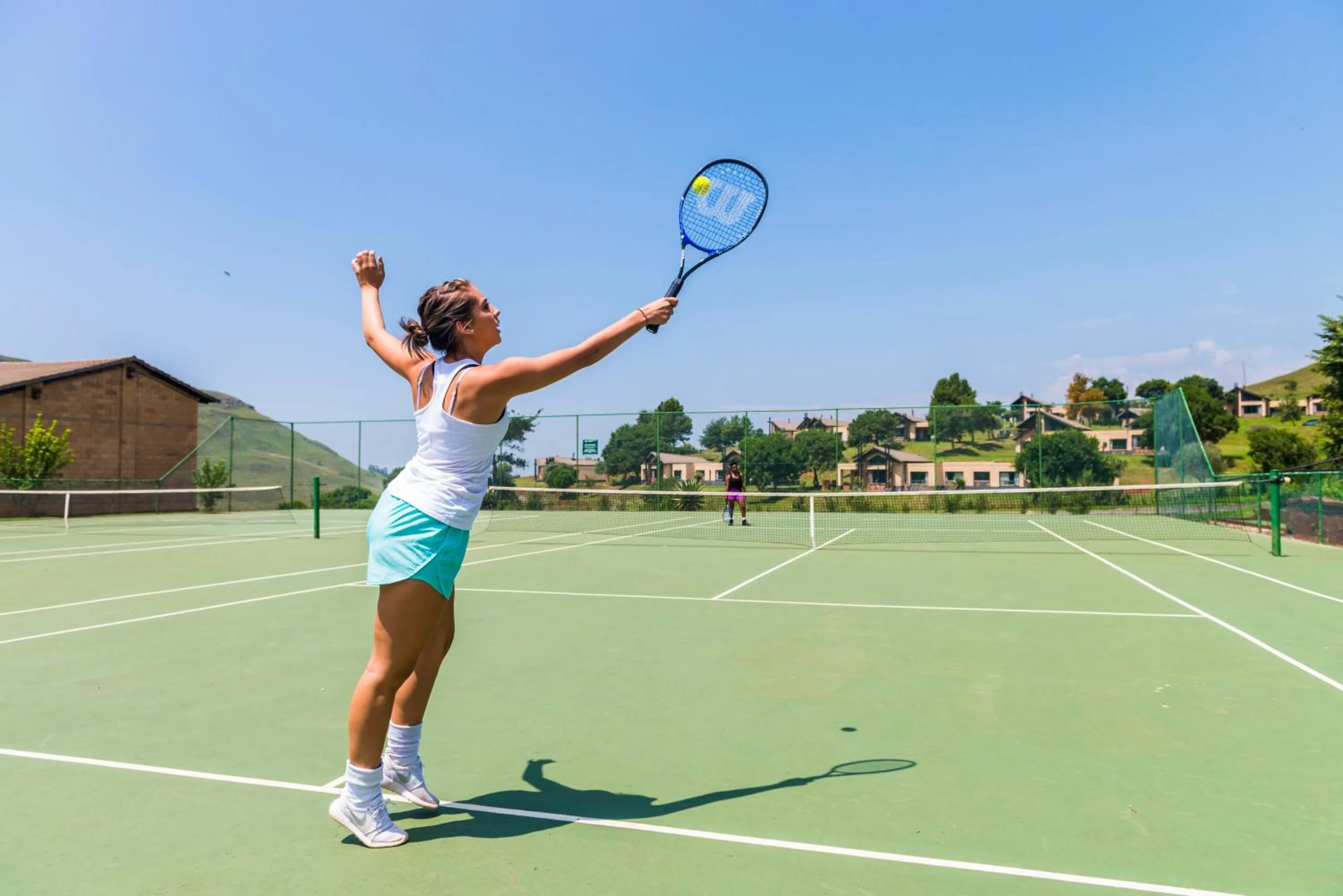 Tennis court in aha Alpine Heath Resort