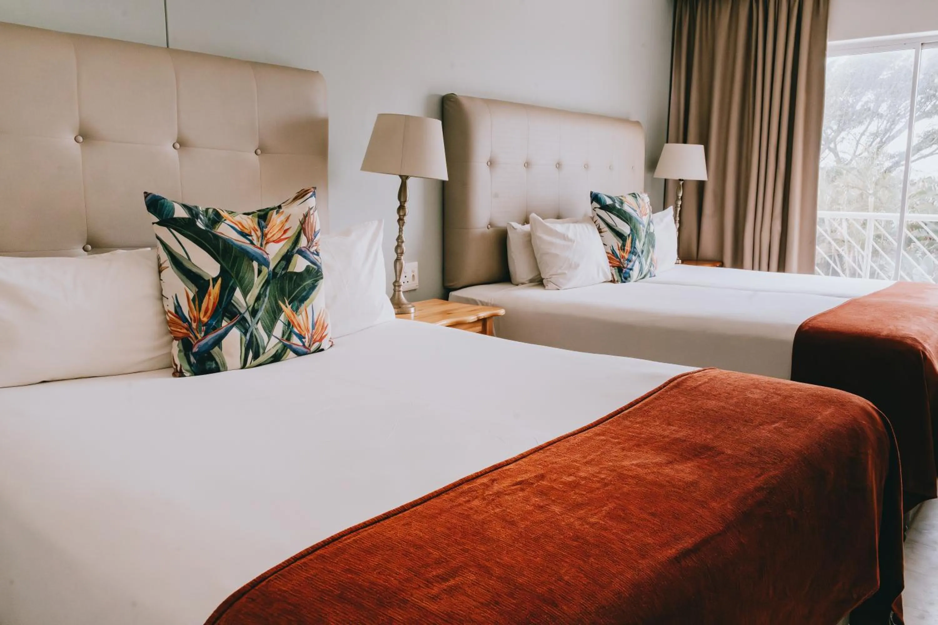 Bed in The Riverside Hotel