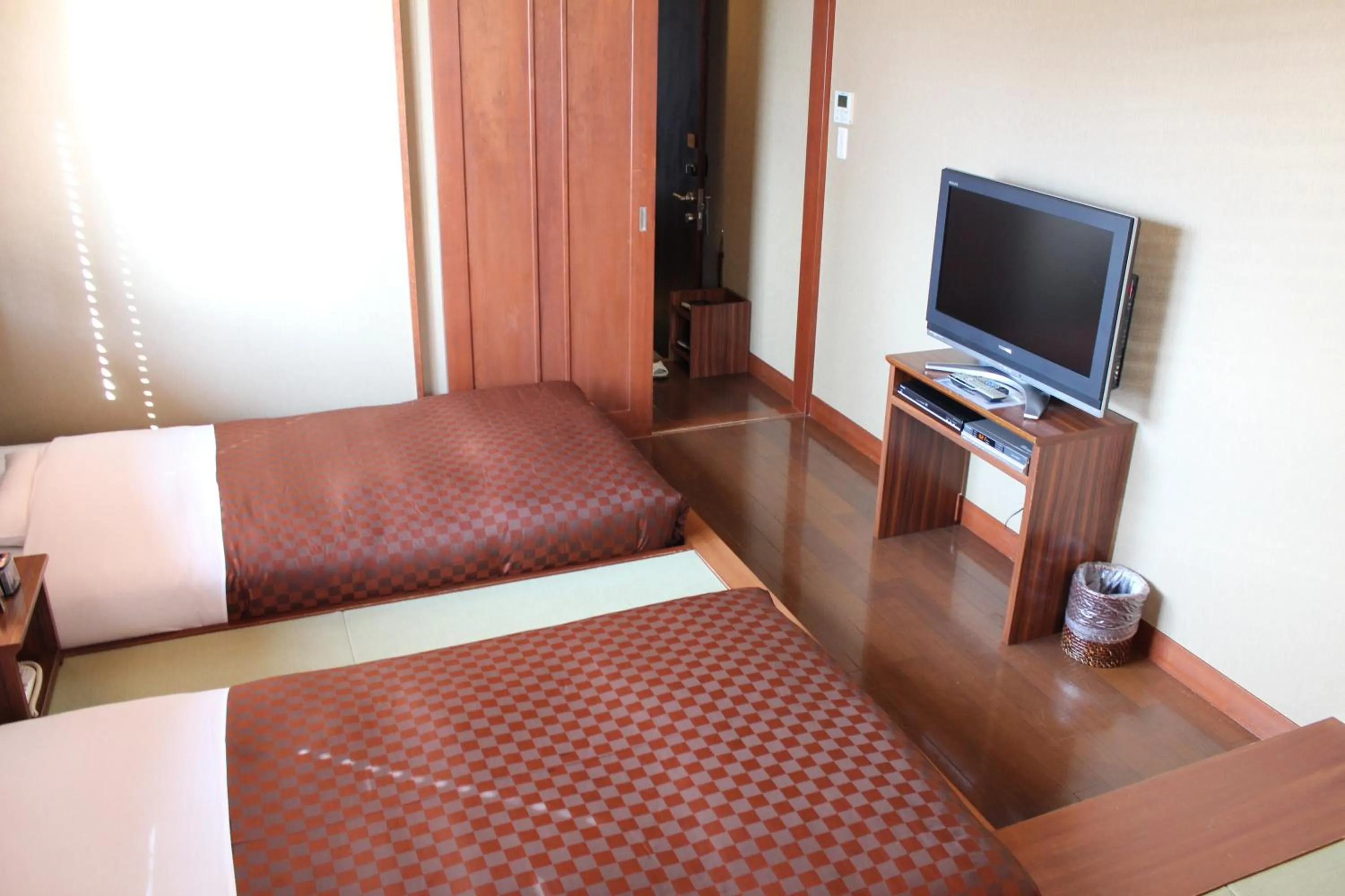 Photo of the whole room, Bed in Hotel Saika