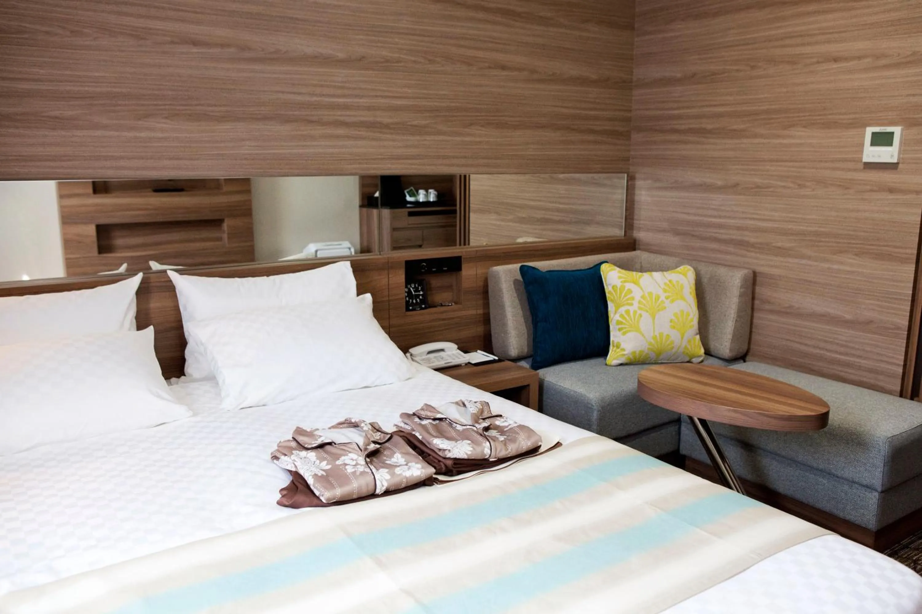 Decorative detail, Bed in Almont Hotel Naha Kenchomae