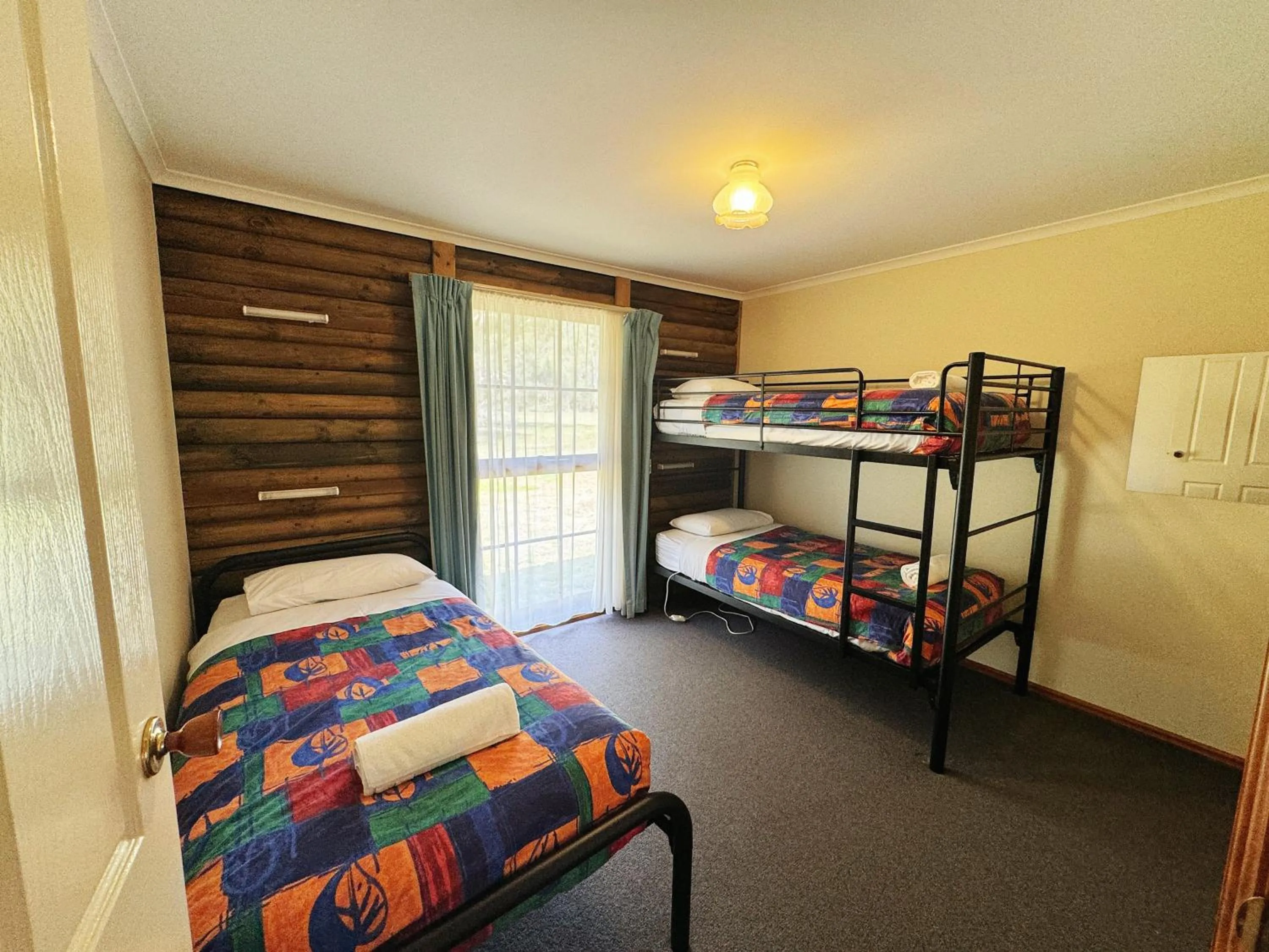 Bed in Halls Gap Log Cabins