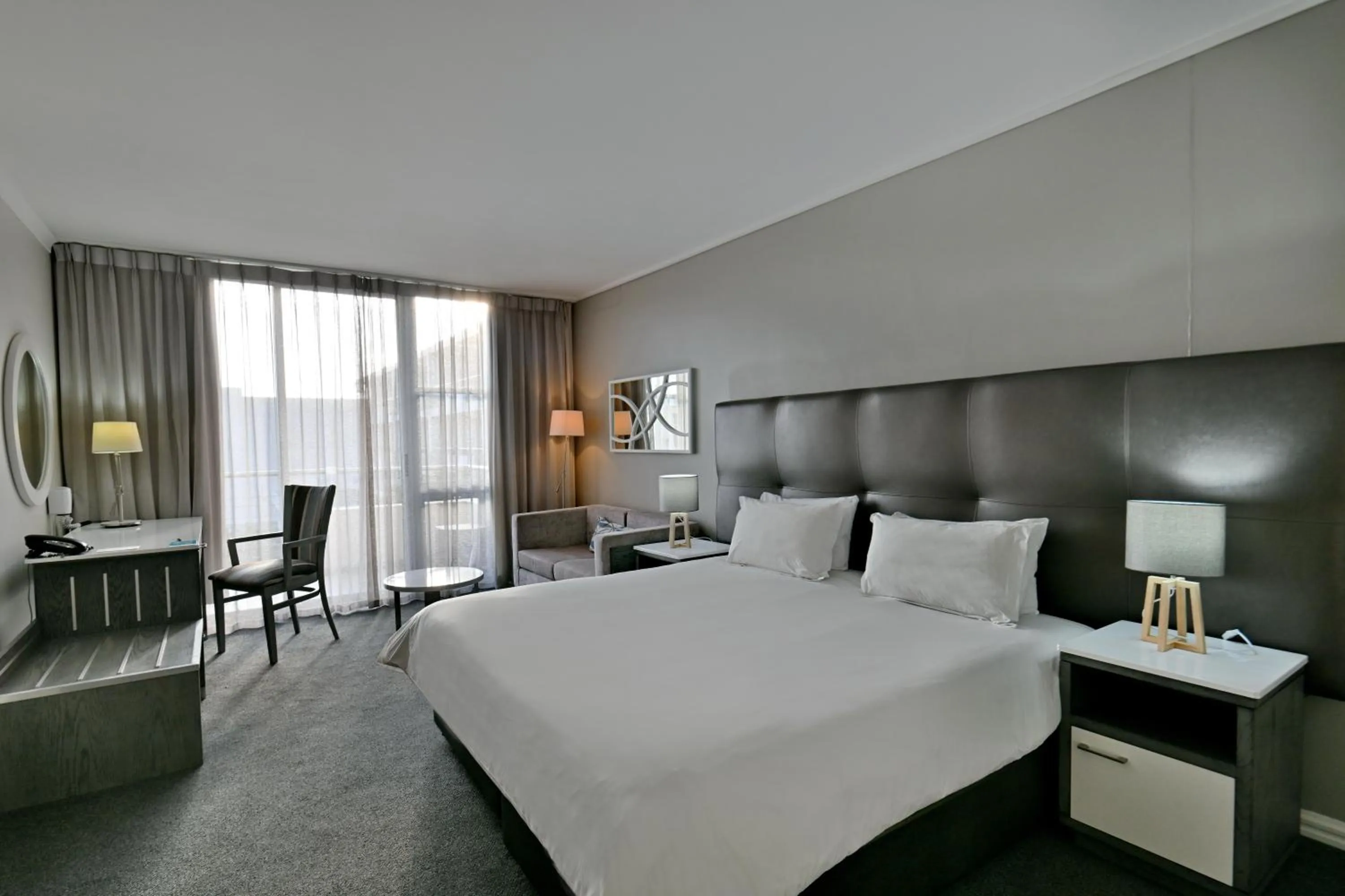 Bed in Lagoon Beach Hotel & Spa