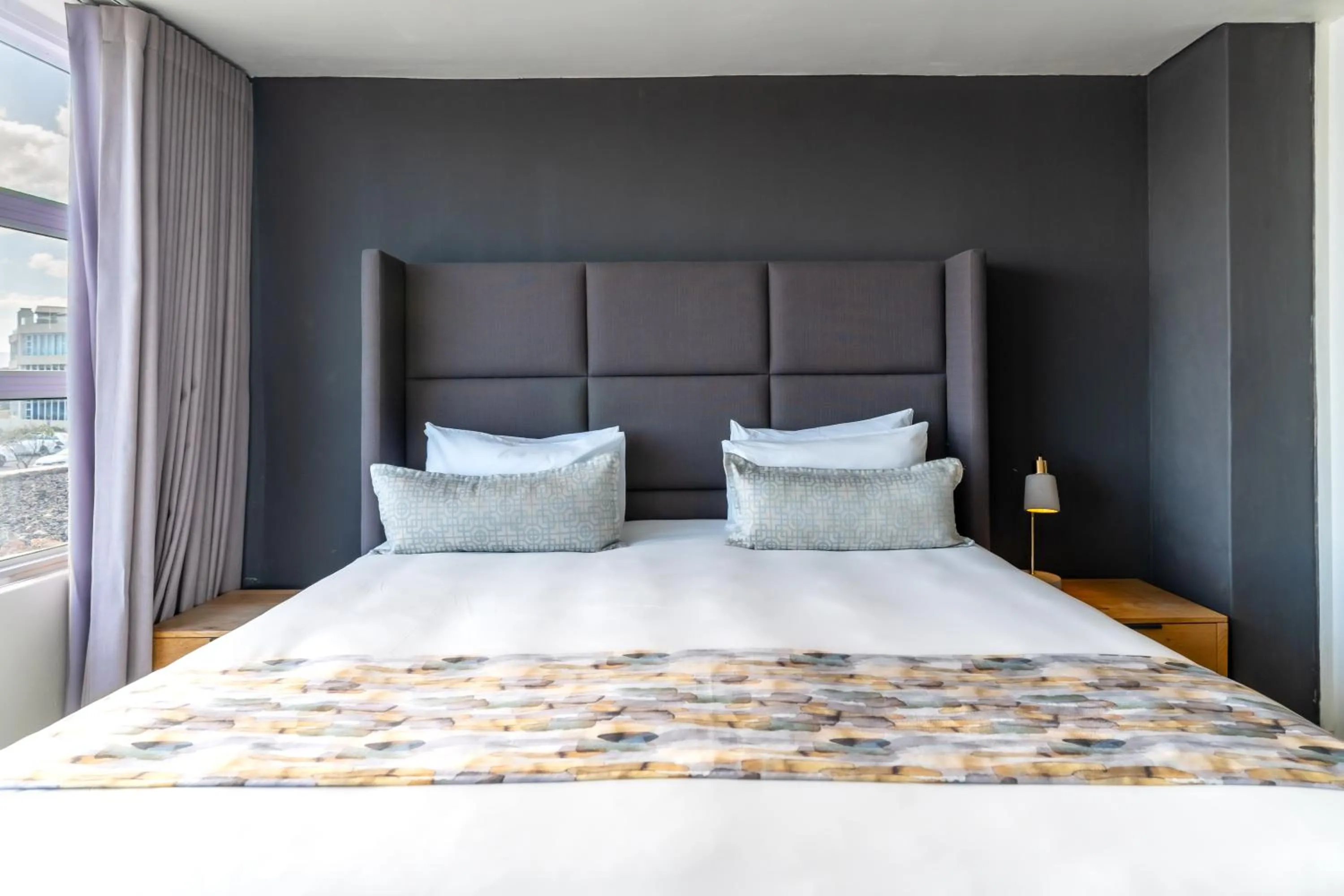 Bedroom, Bed in Lagoon Beach Hotel & Spa