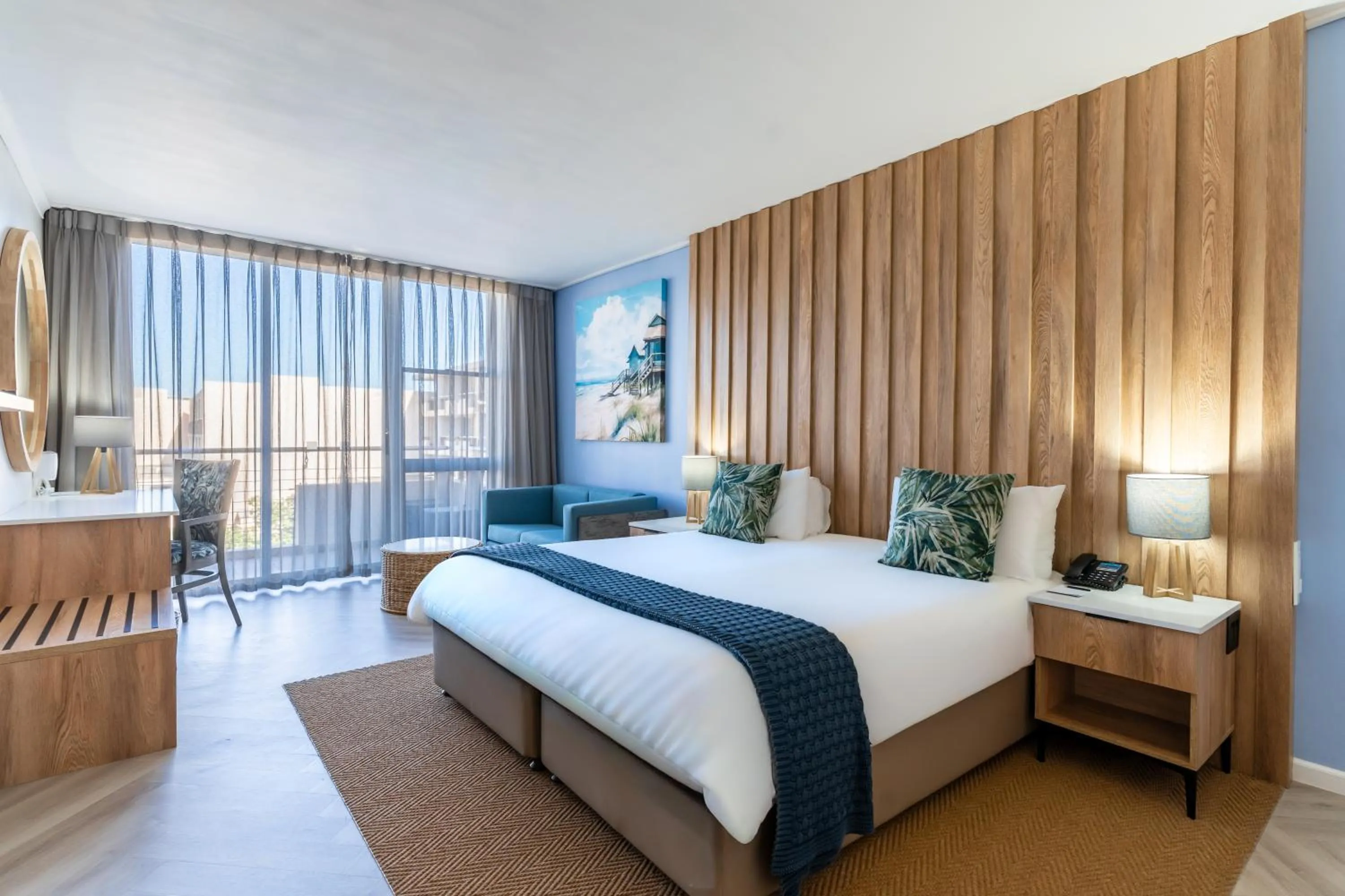 Bed in Lagoon Beach Hotel & Spa