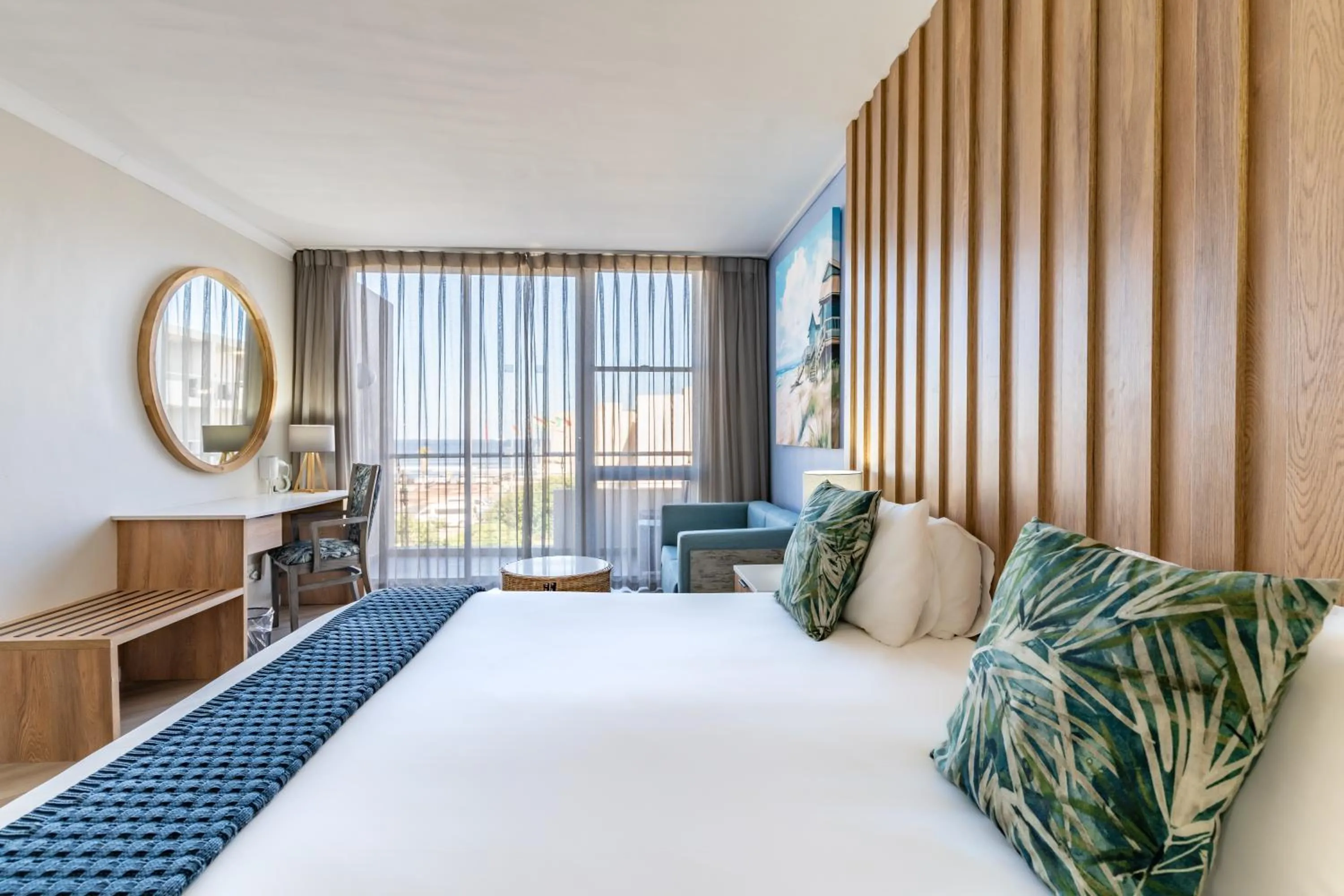 Bed in Lagoon Beach Hotel & Spa