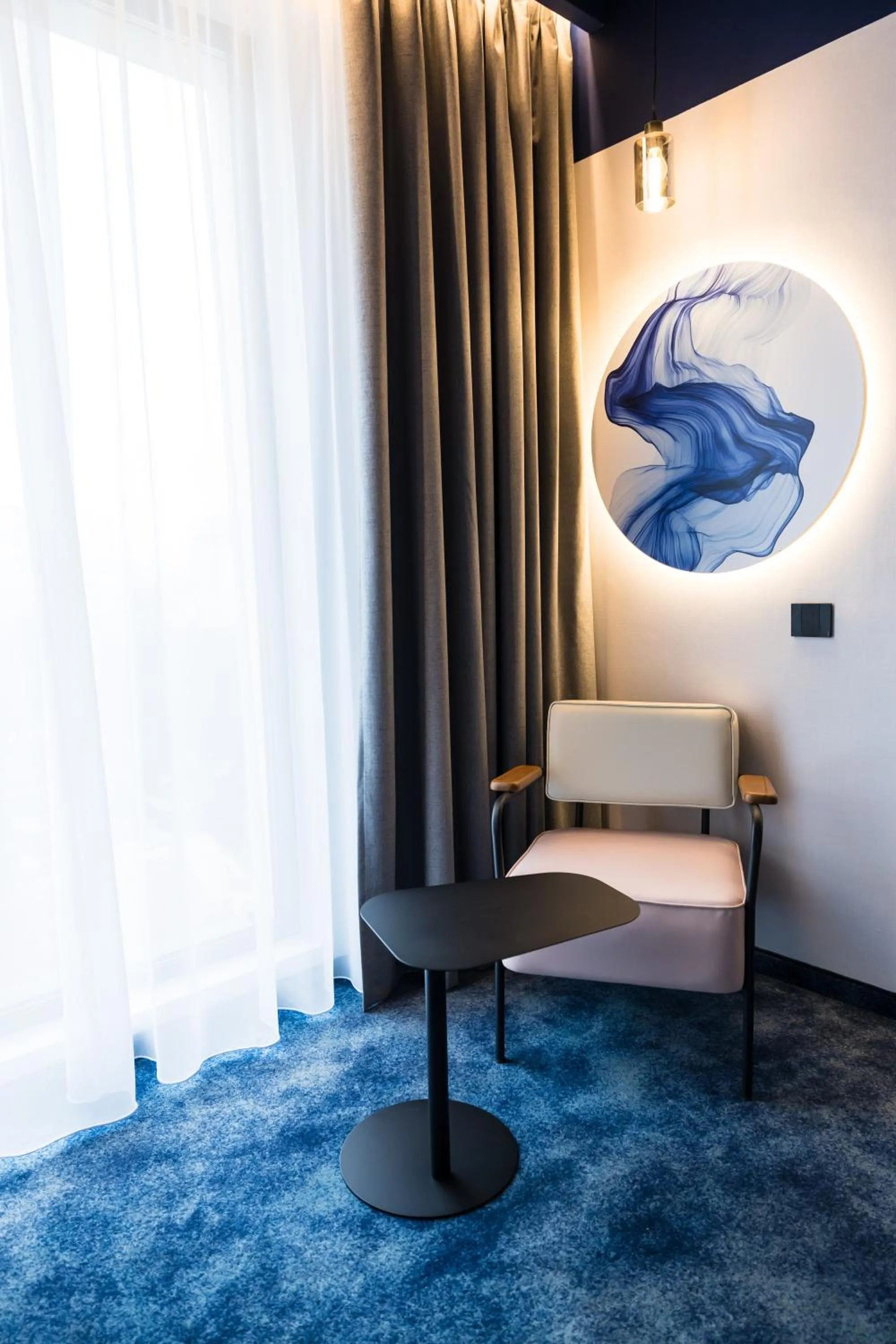 Seating area, Bed in Mercure Bucharest Cantemir