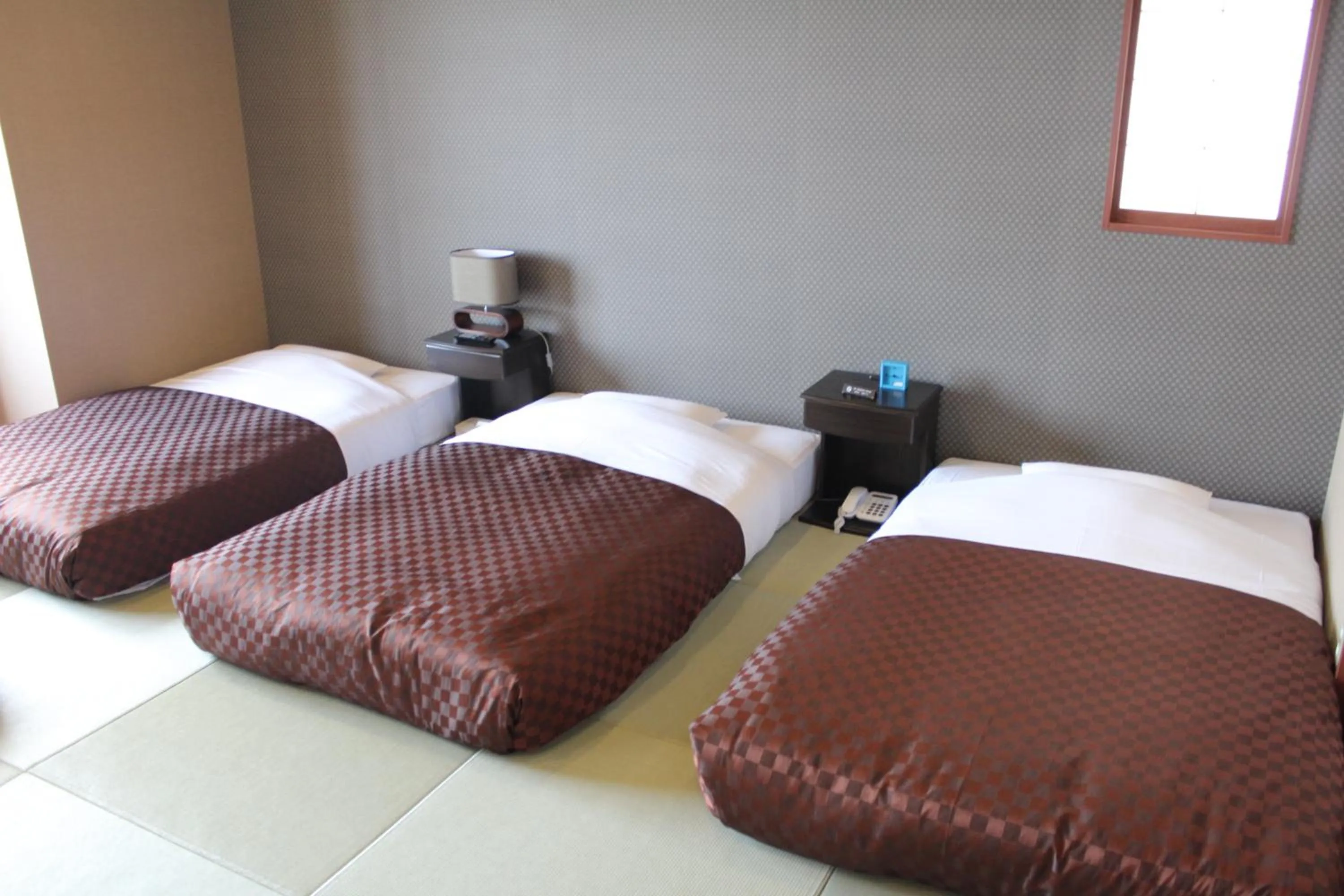 Bed in Hotel Shiosai