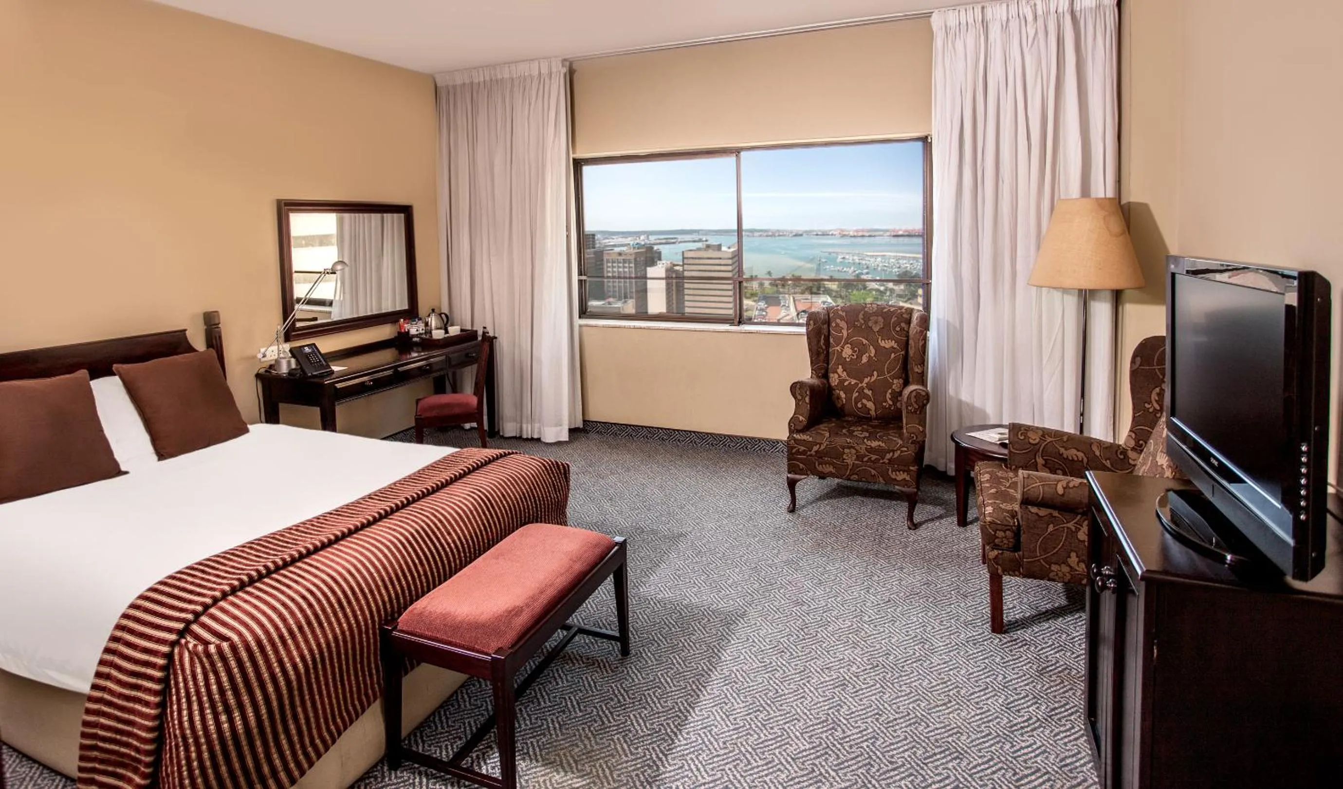 Photo of the whole room, Bed in The Royal Hotel by Coastlands Hotels & Resorts