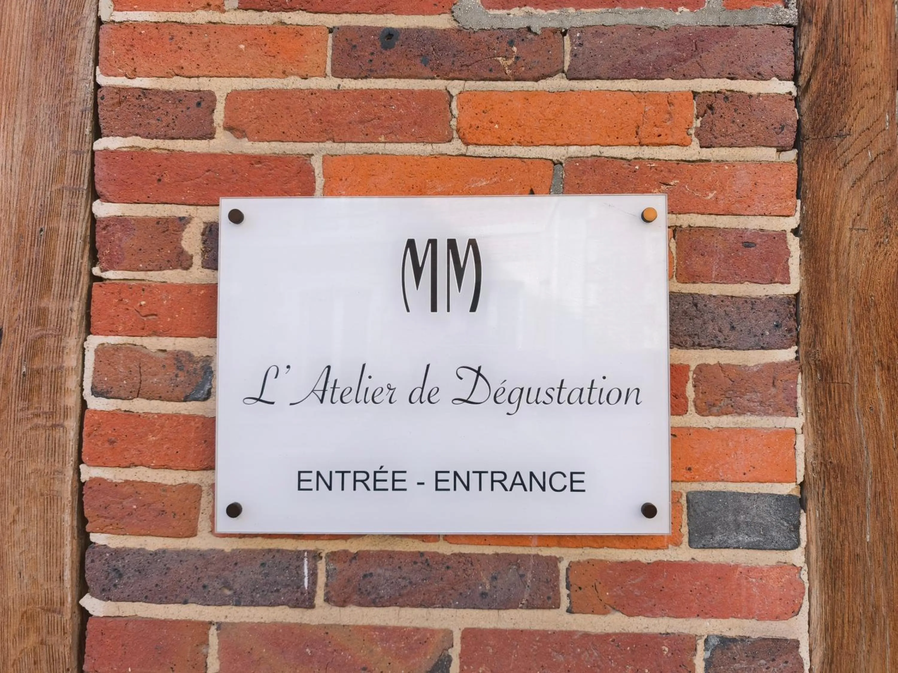 Property logo or sign in L'Atelier De Dégustation