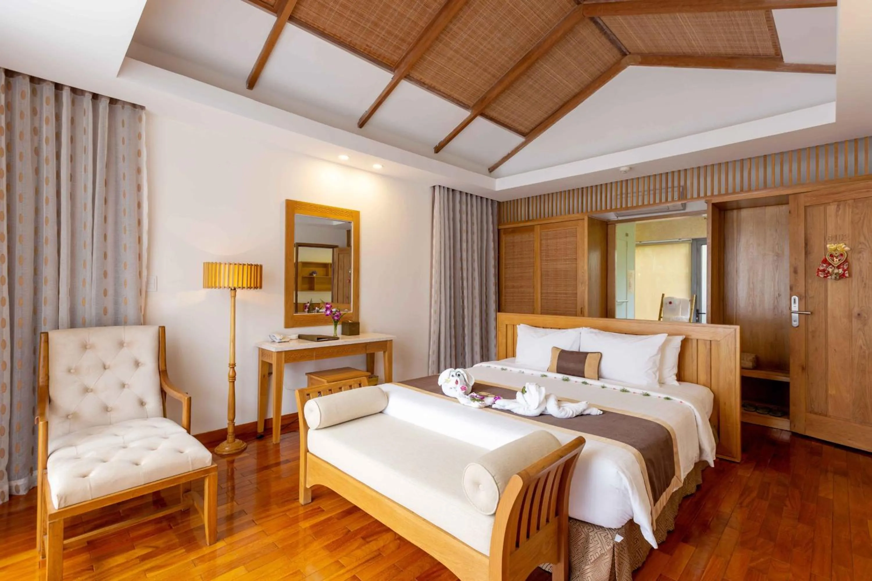 Bed in Sonata Resort & Spa