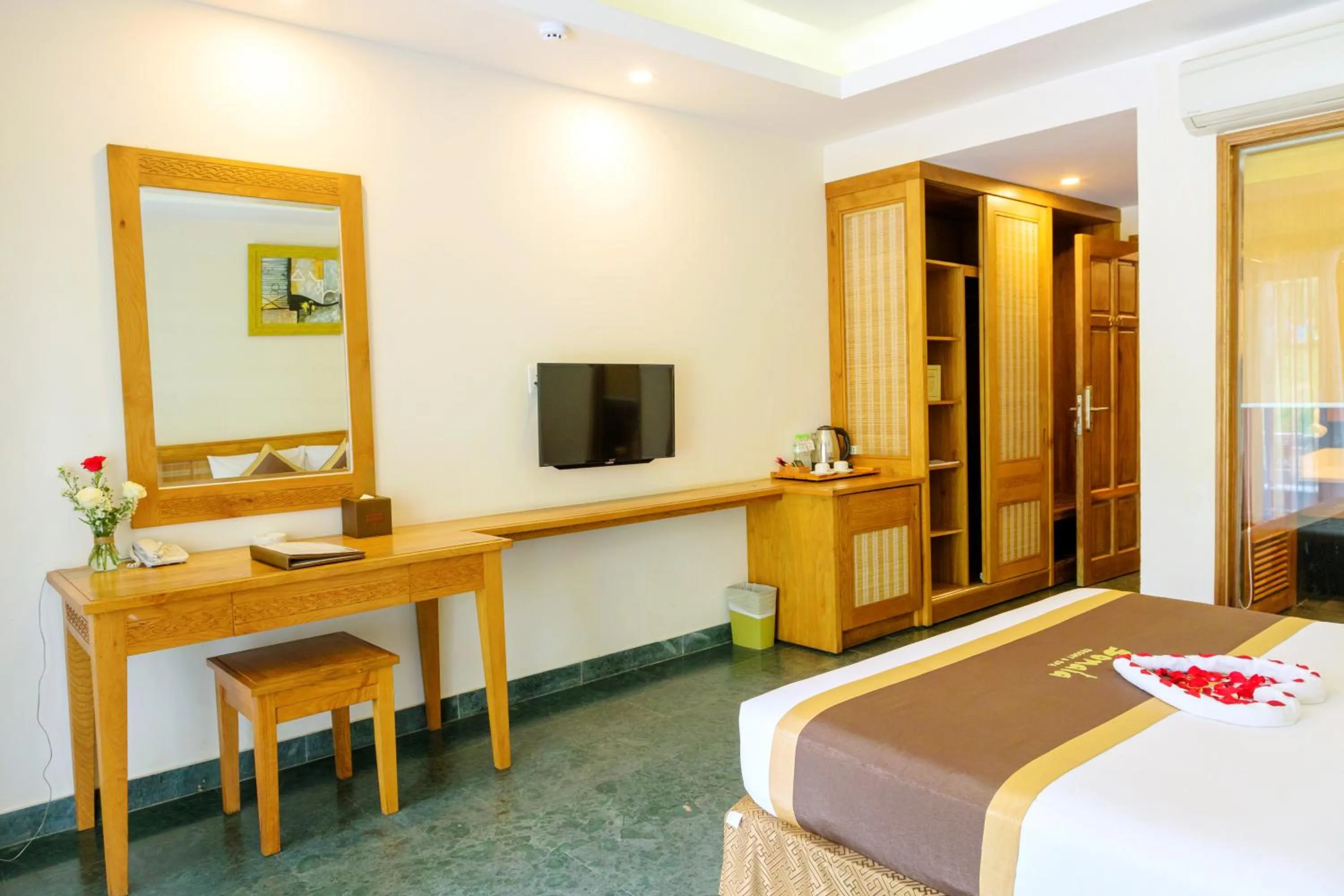 Bed in Sonata Resort & Spa