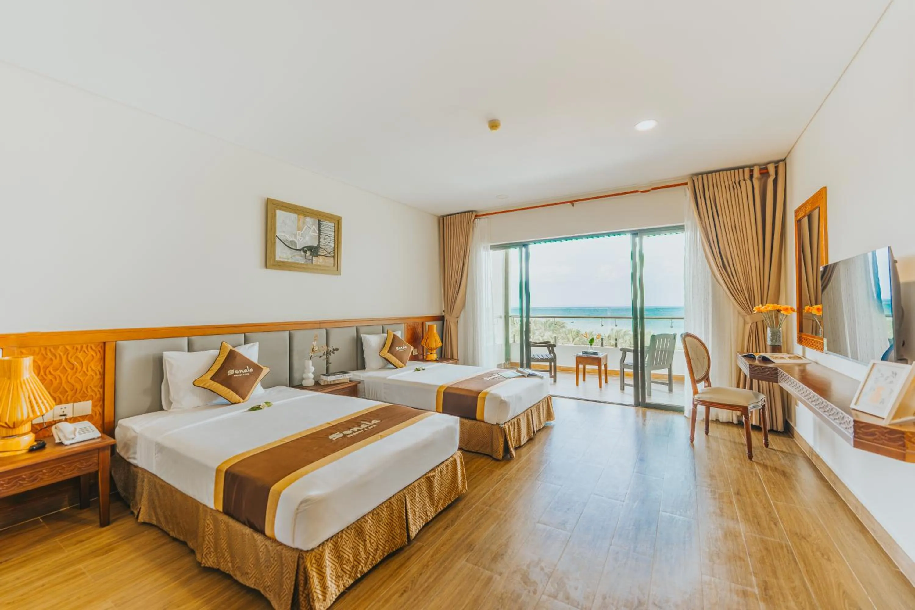 Bed in Sonata Resort & Spa