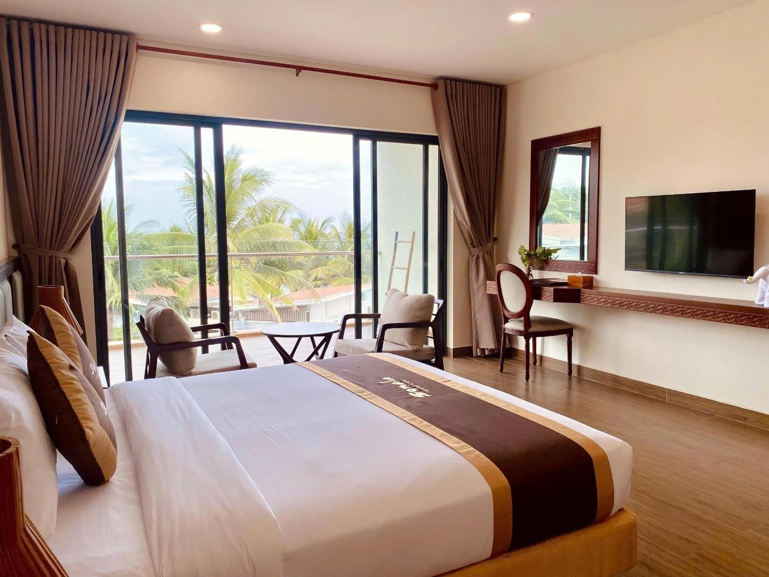 Bed in Sonata Resort & Spa