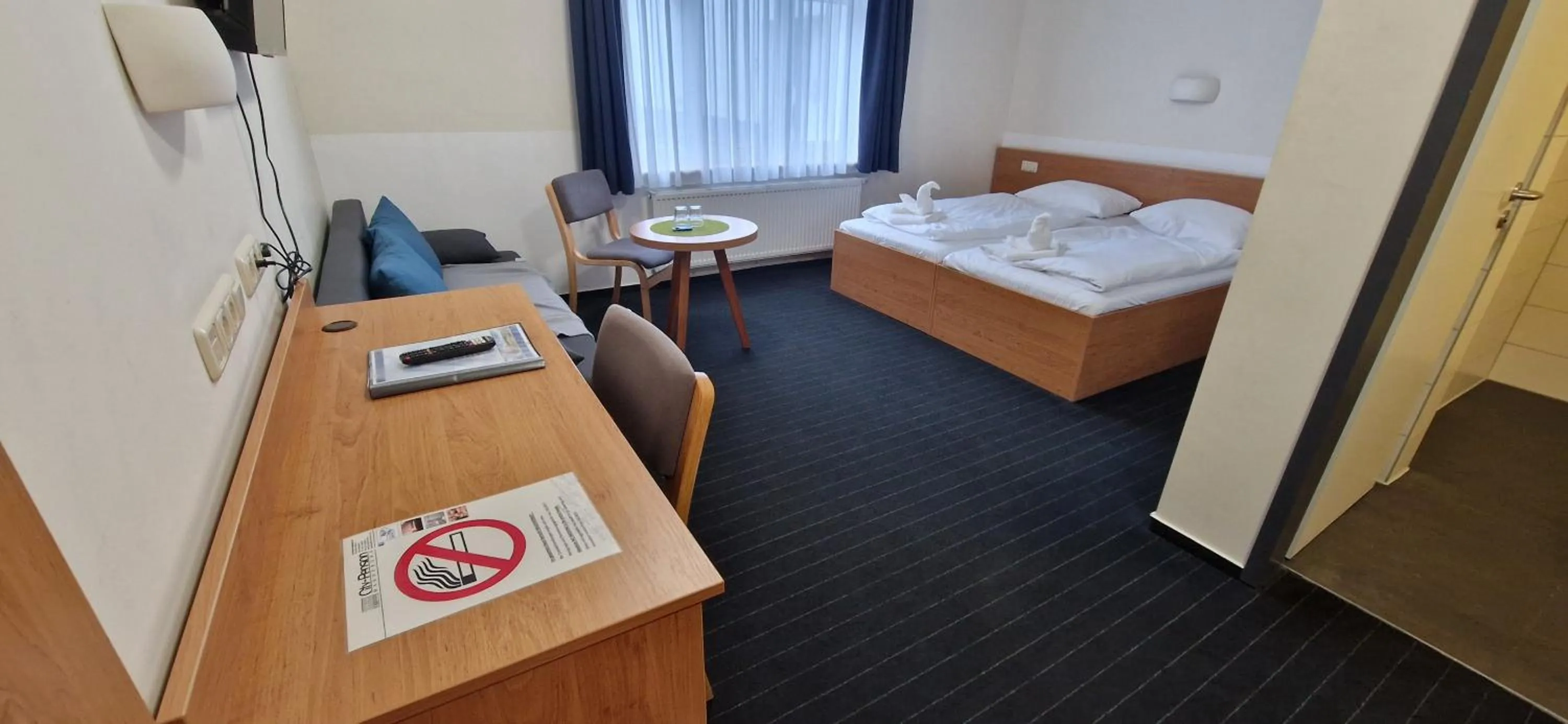 Photo of the whole room, Bed in City-Pension Magdeburg
