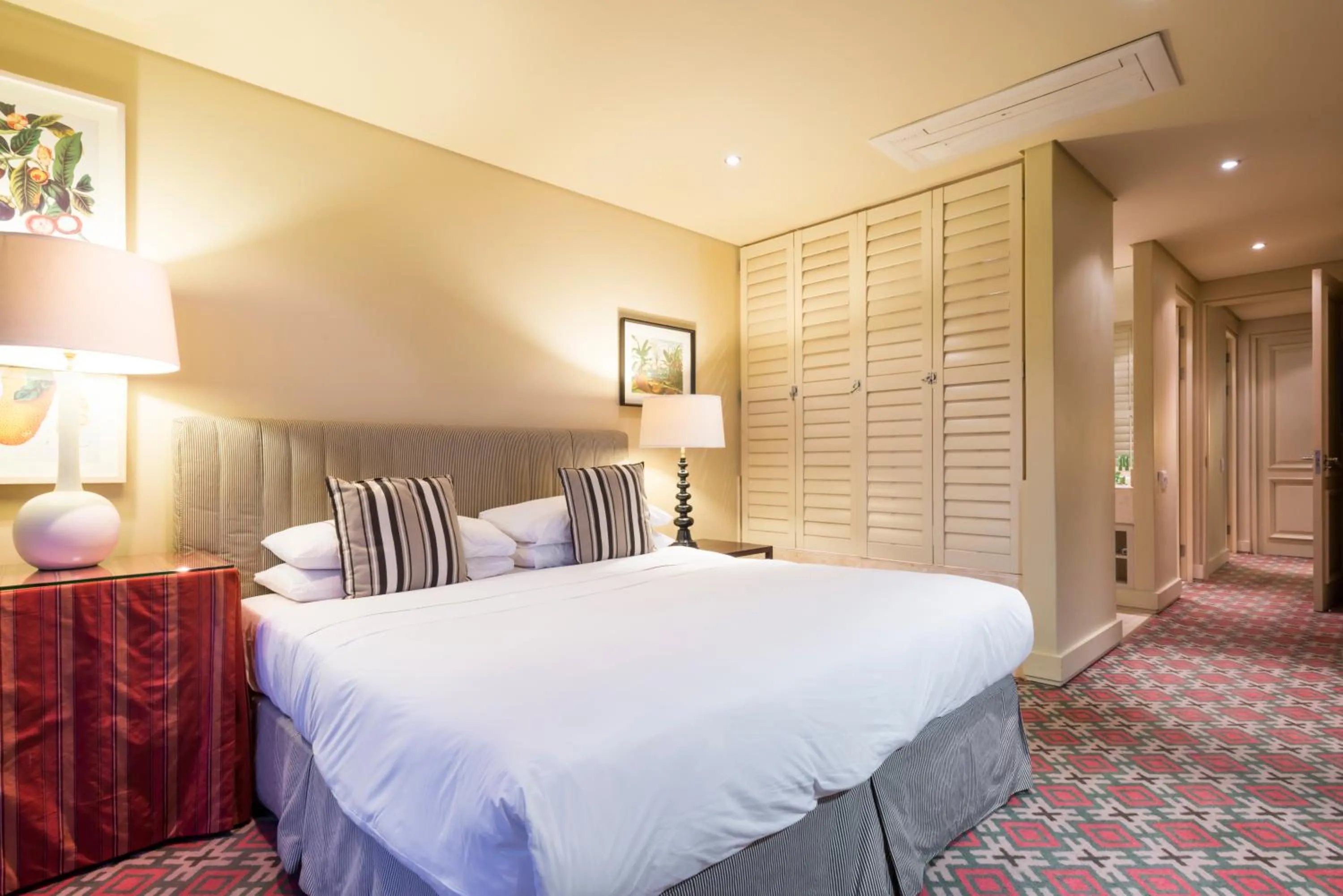 Bed in Royal Palm Hotel