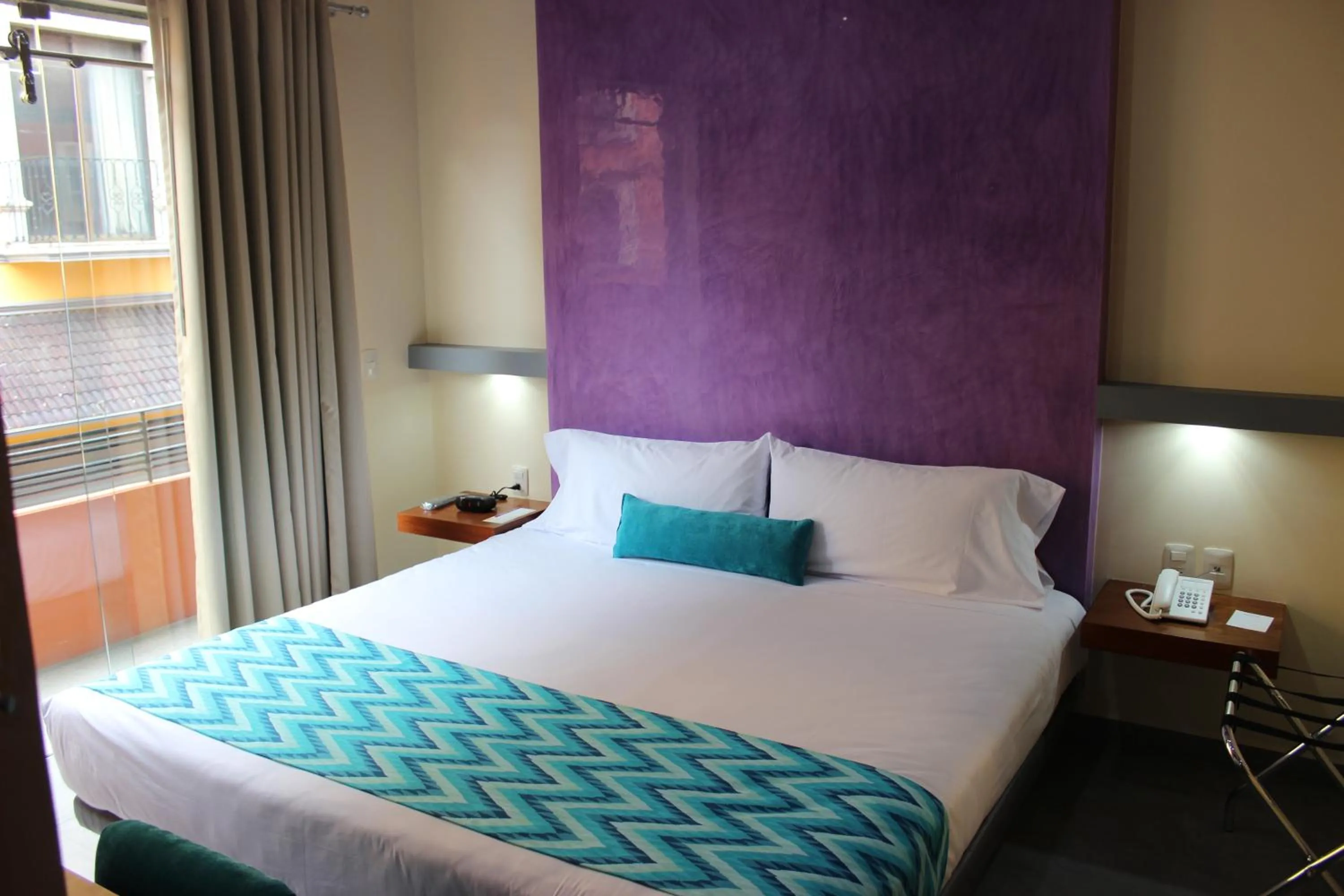 Superior King Room  with Interior and Exterior View in Orizaba Inn