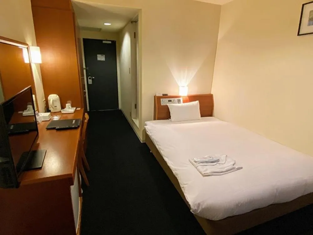 Bed in Blue Port Hotel Kitakyushu Airport