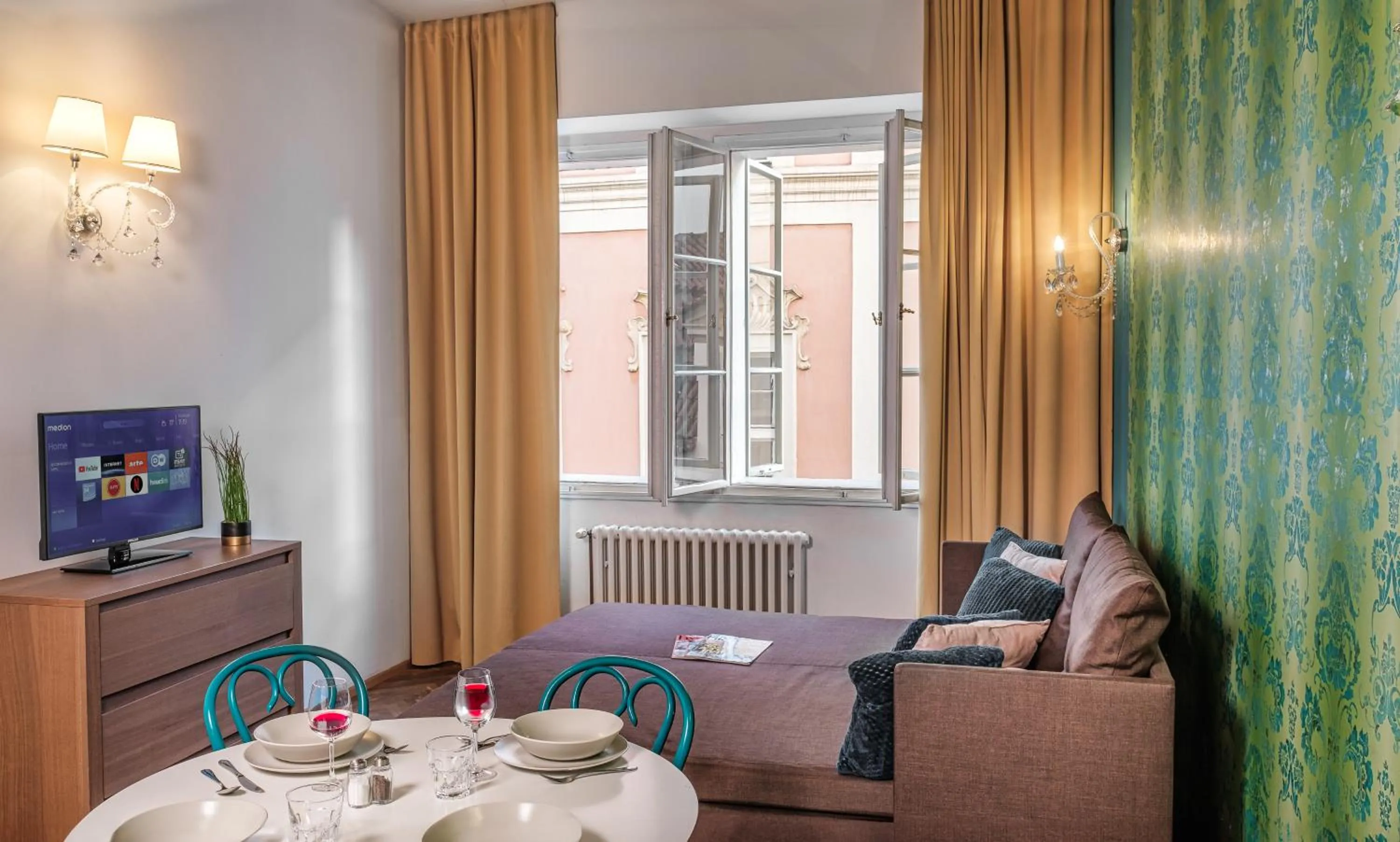 Living room in 7 Tales Apartments by Adrez