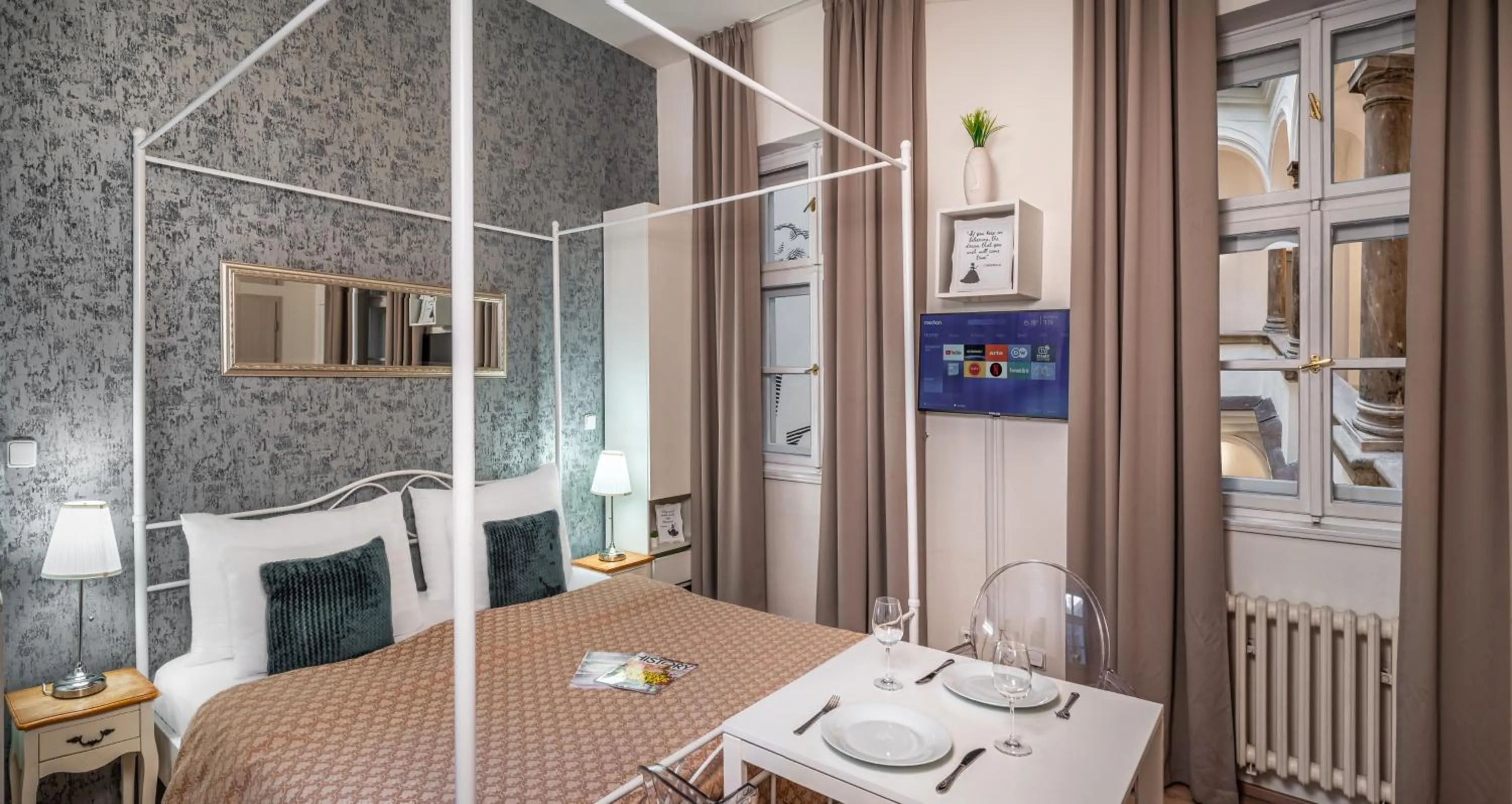 Bed in 7 Tales Apartments by Adrez