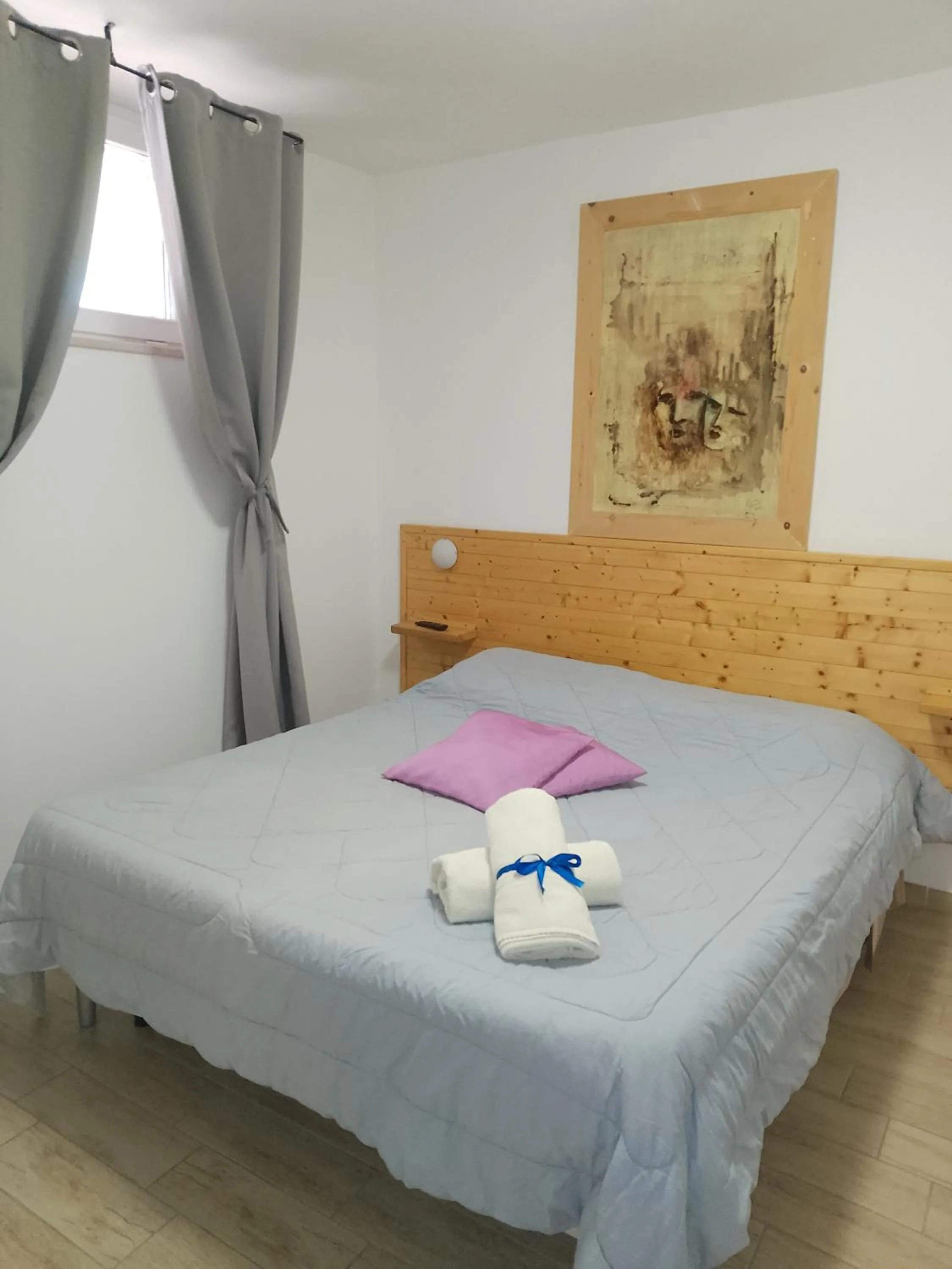 Bed in Art Village Residence