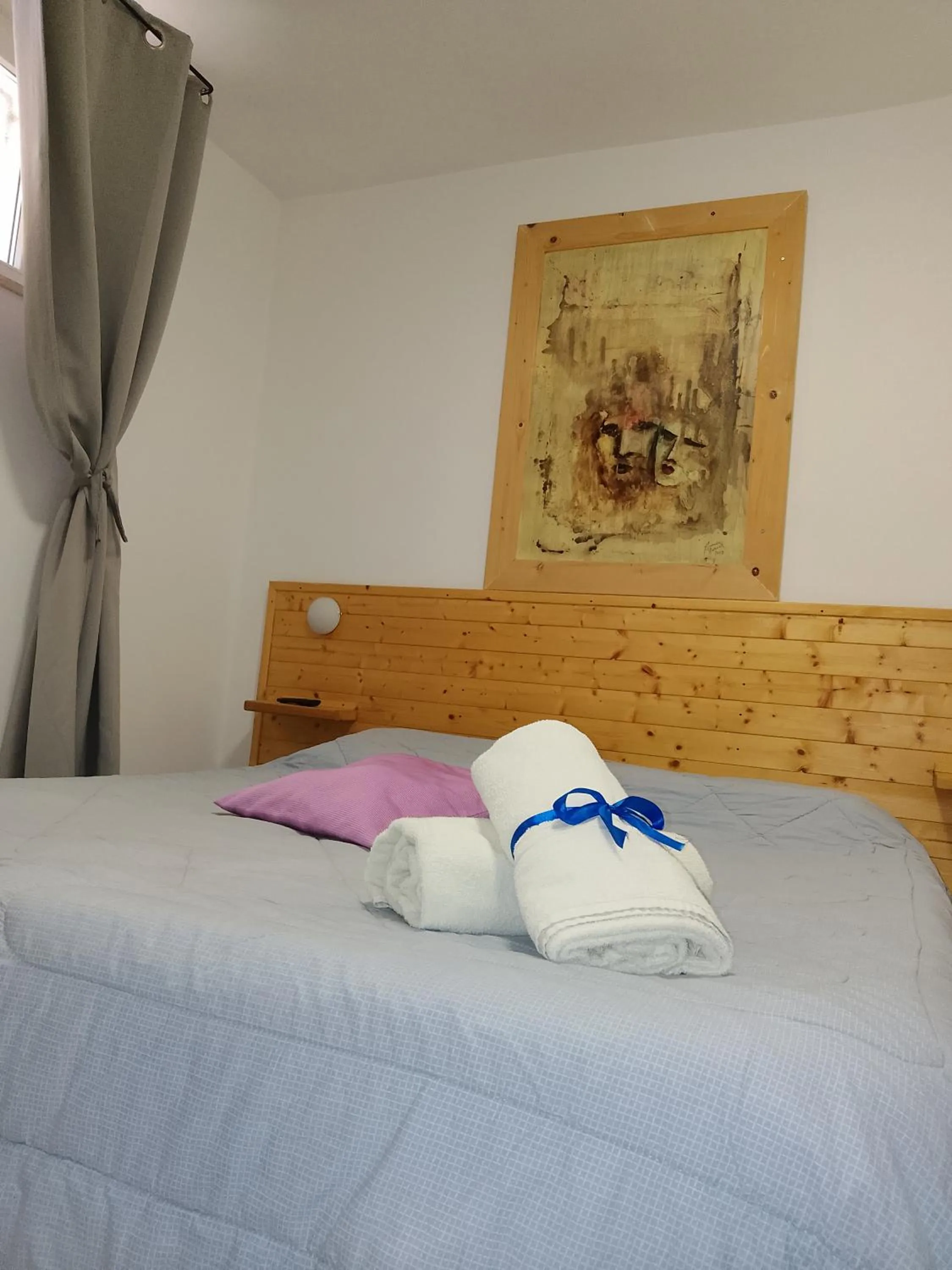 Bed in Art Village Residence