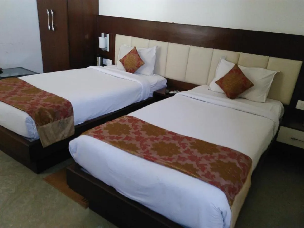 Bed in Hotel Taj Heights