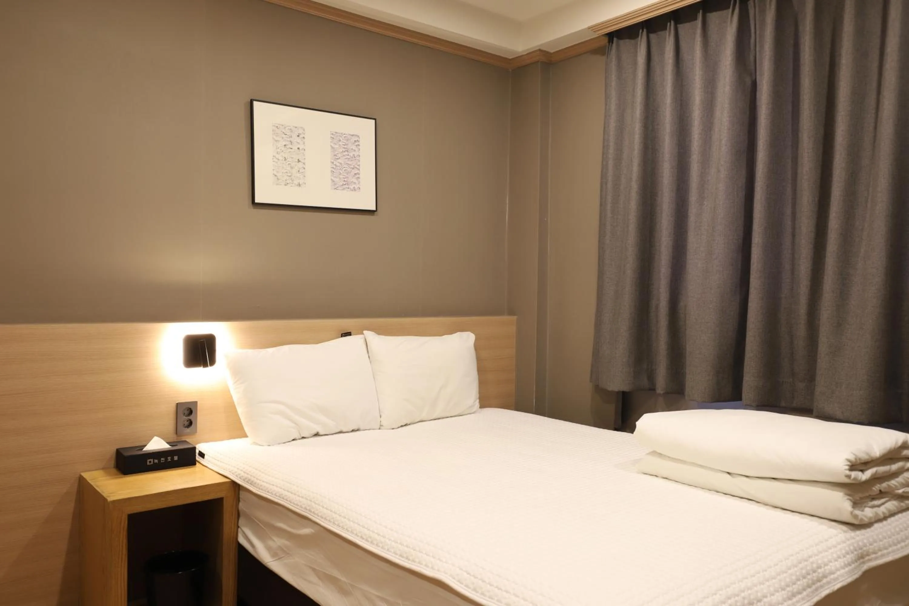 Bed in Busan Nokcheon Hot Spring Hotel