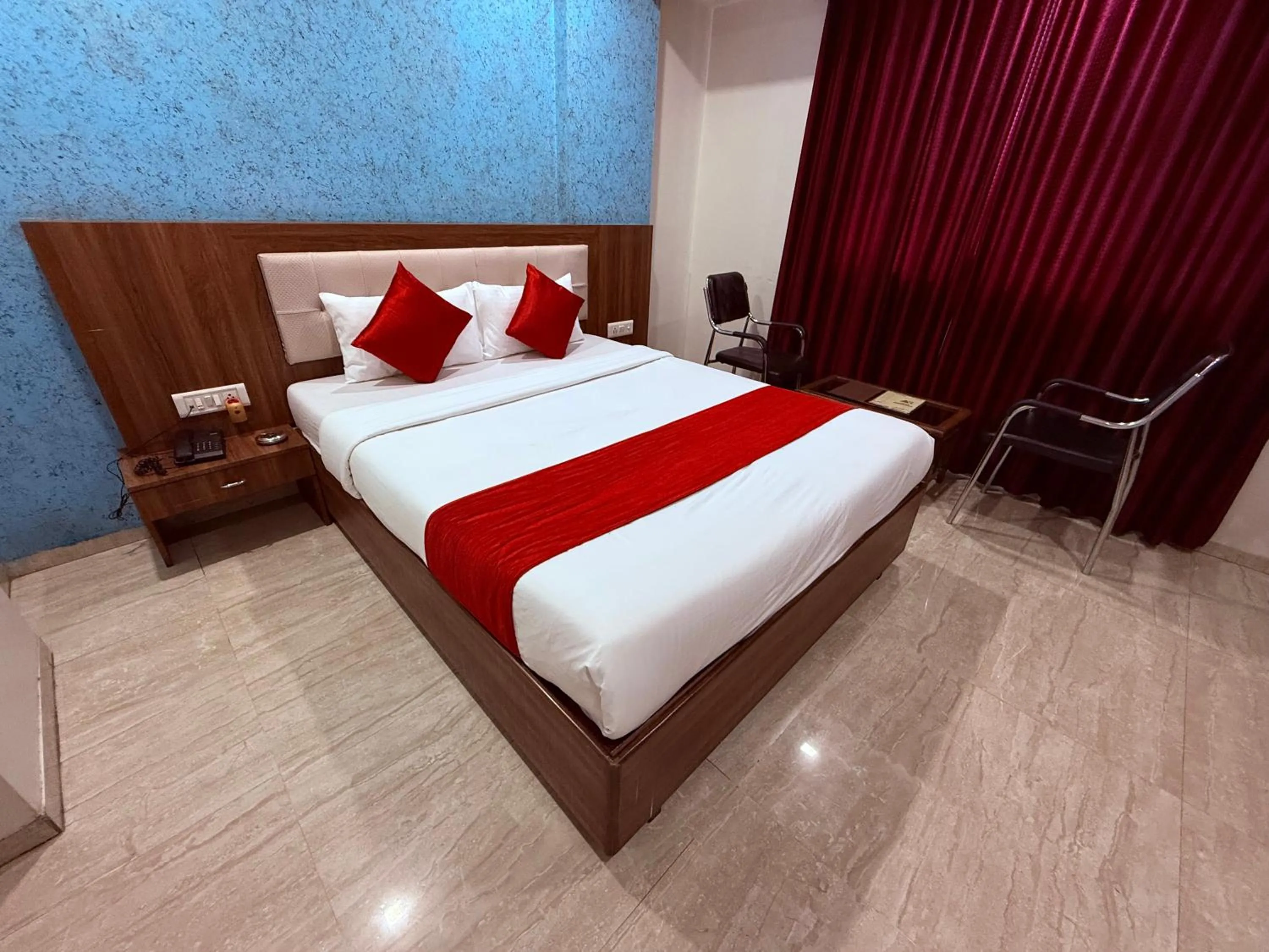 Bed in Hotel Arya Residency Rabale
