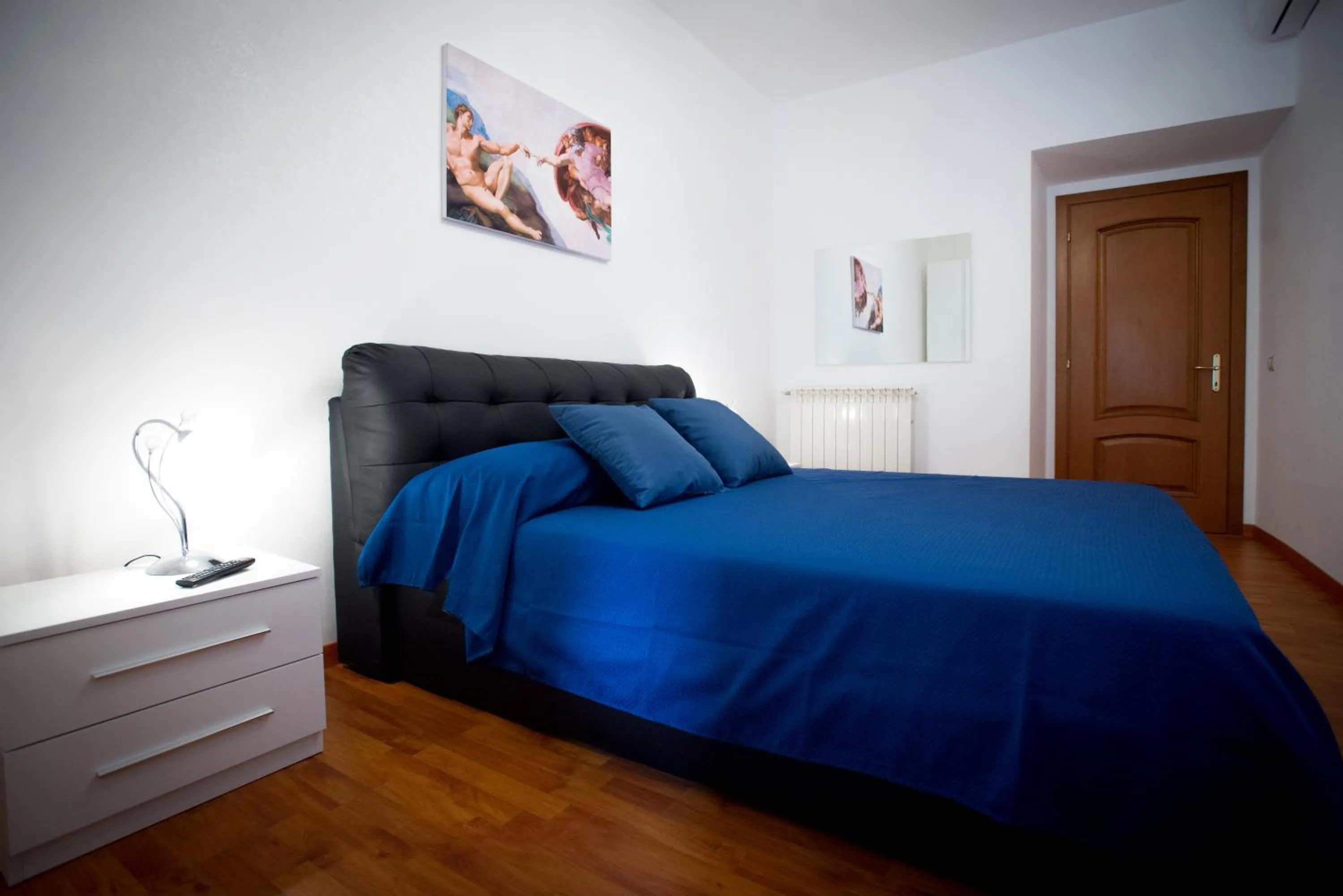 Photo of the whole room, Bed in Vatican Art Place