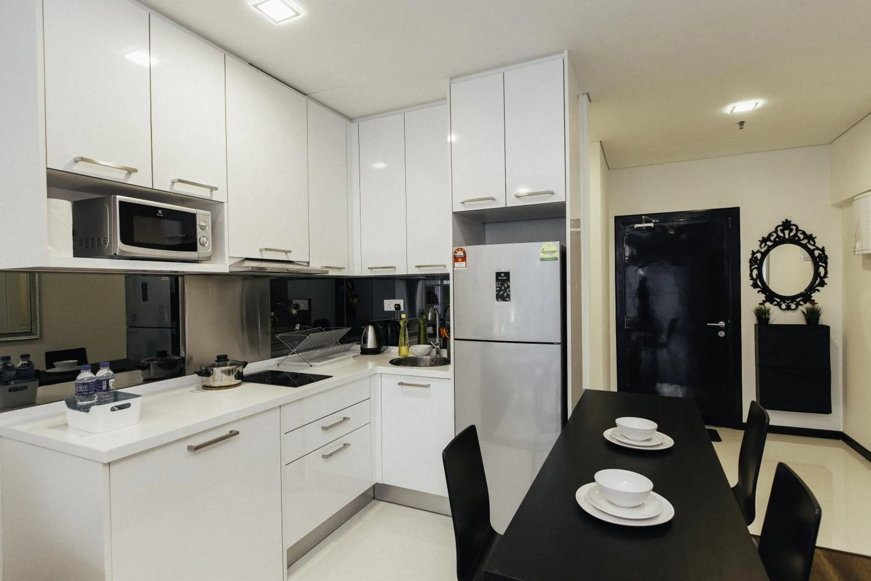 Kitchen or kitchenette in Mercu Summer Suites Bernice KLCC