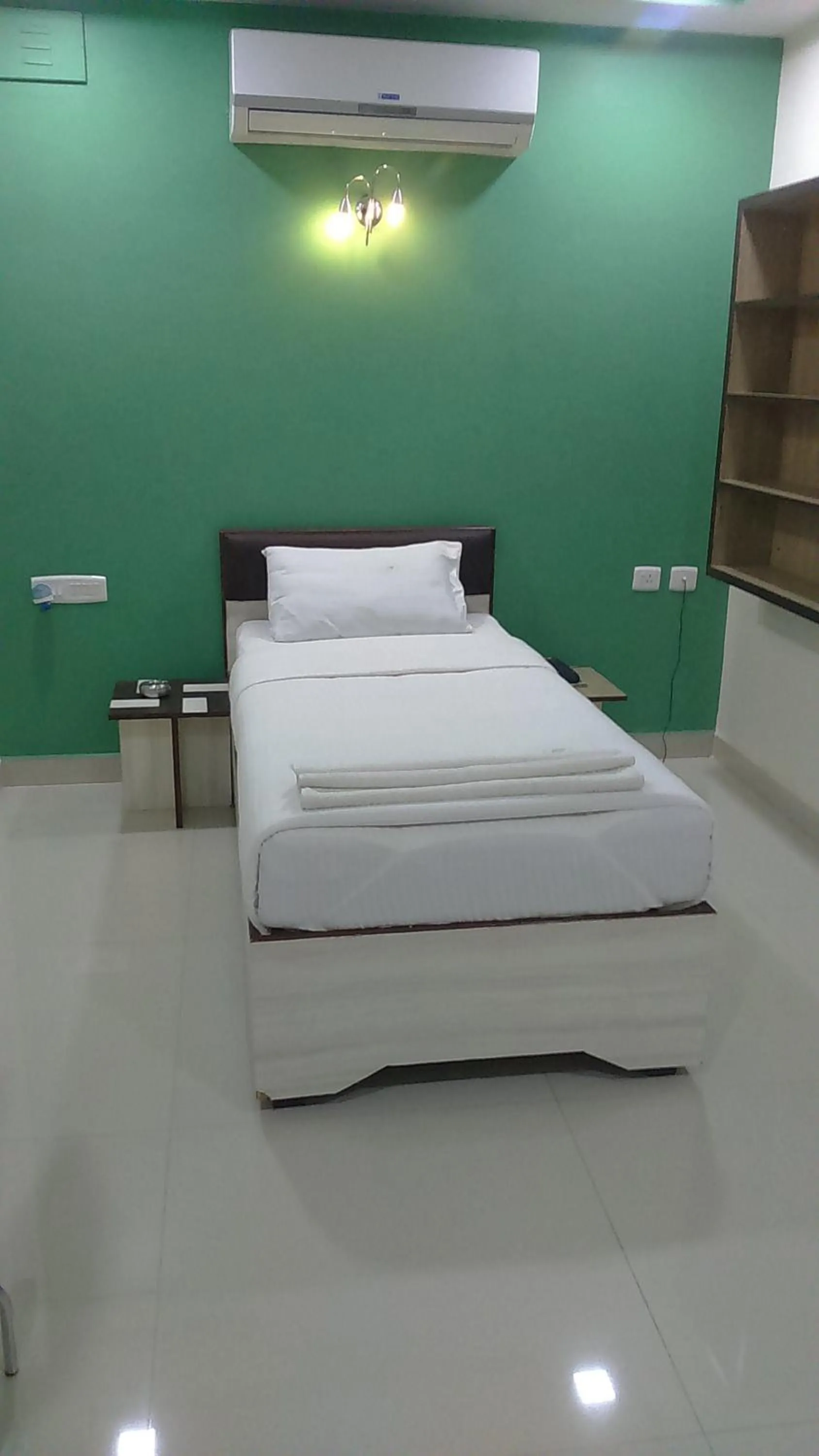 Bed in Sri Hari Residency