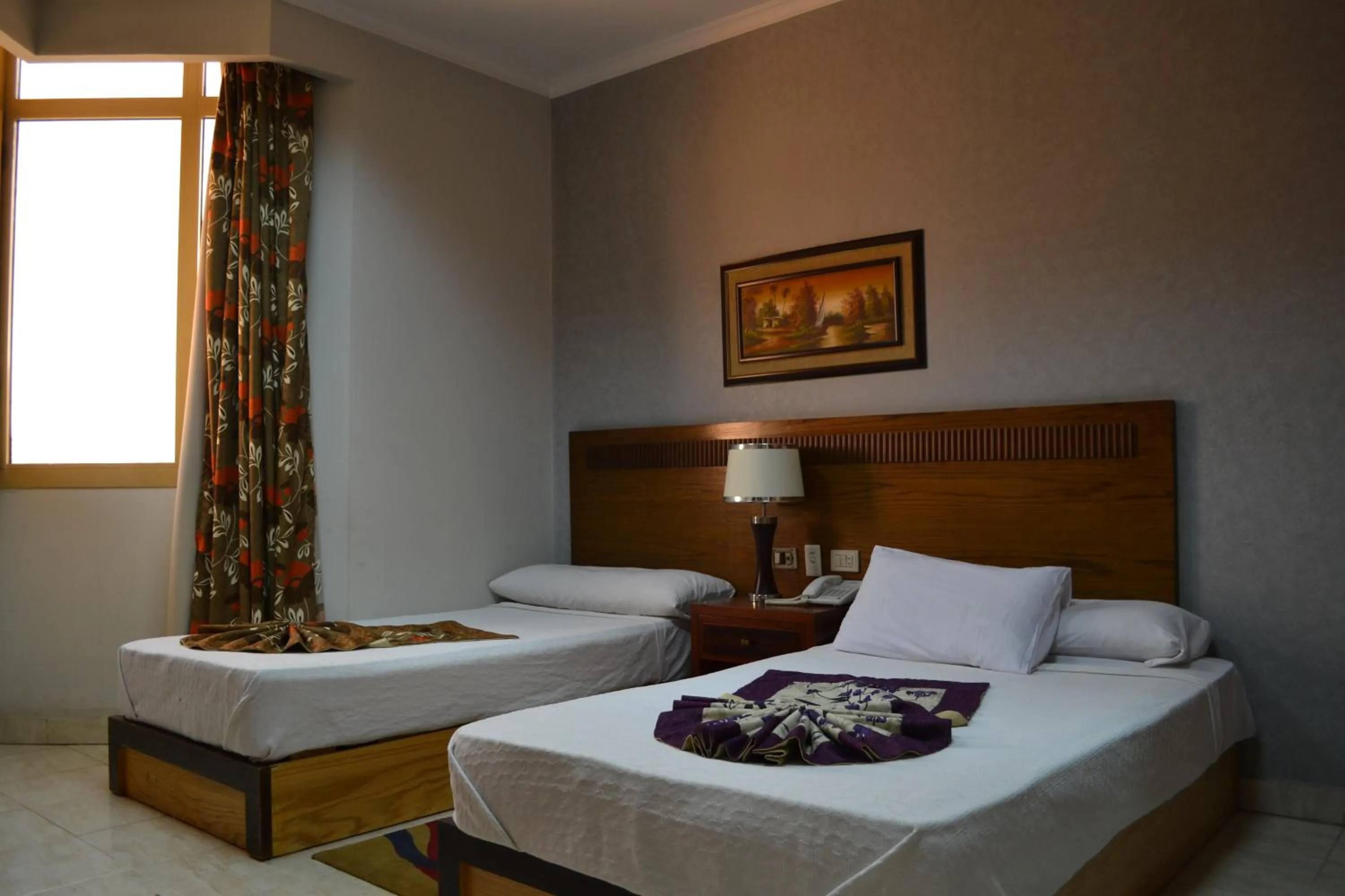 Bed in Jewel Glorious Hotel