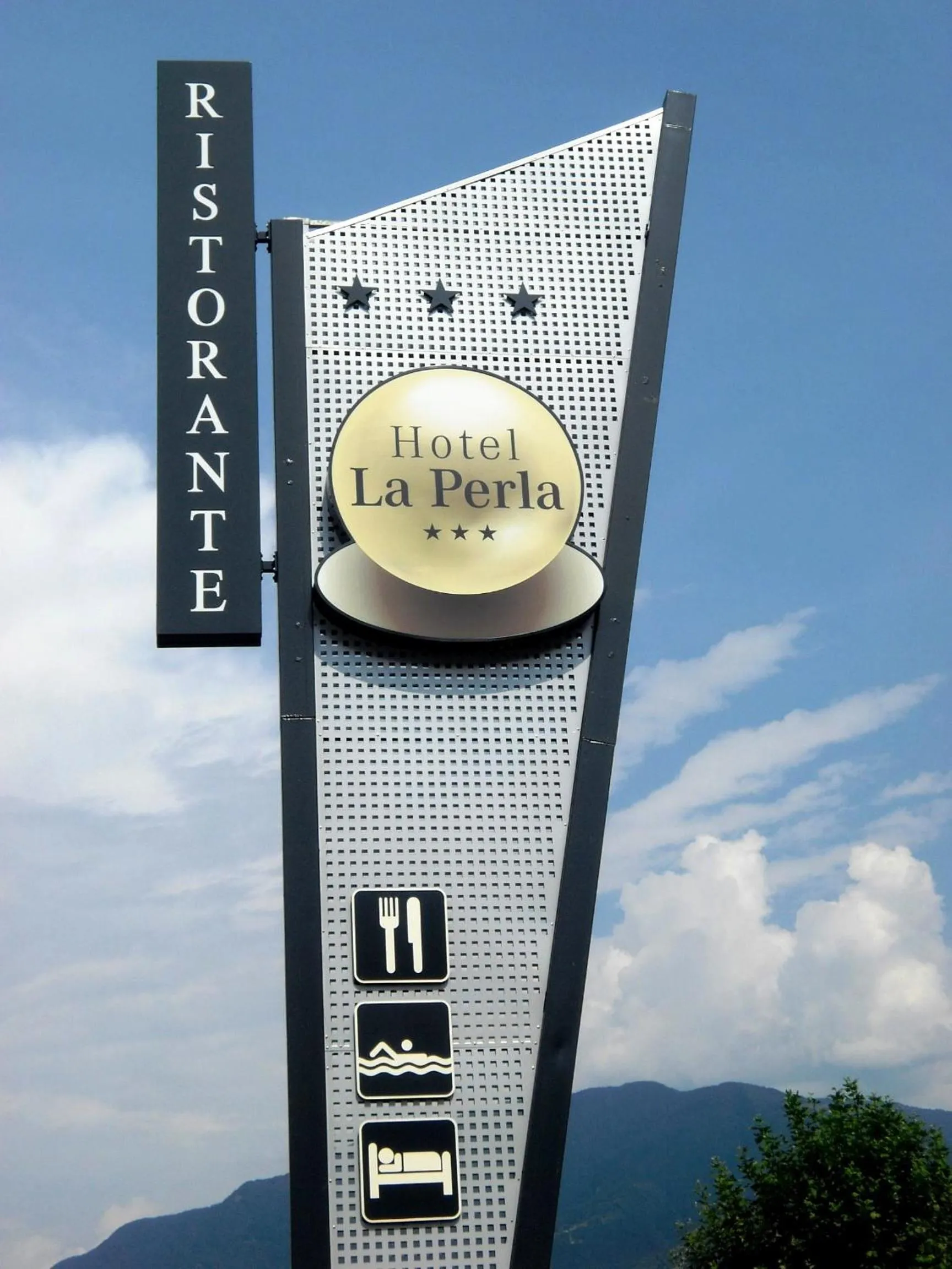 Property logo or sign in Hotel La Perla