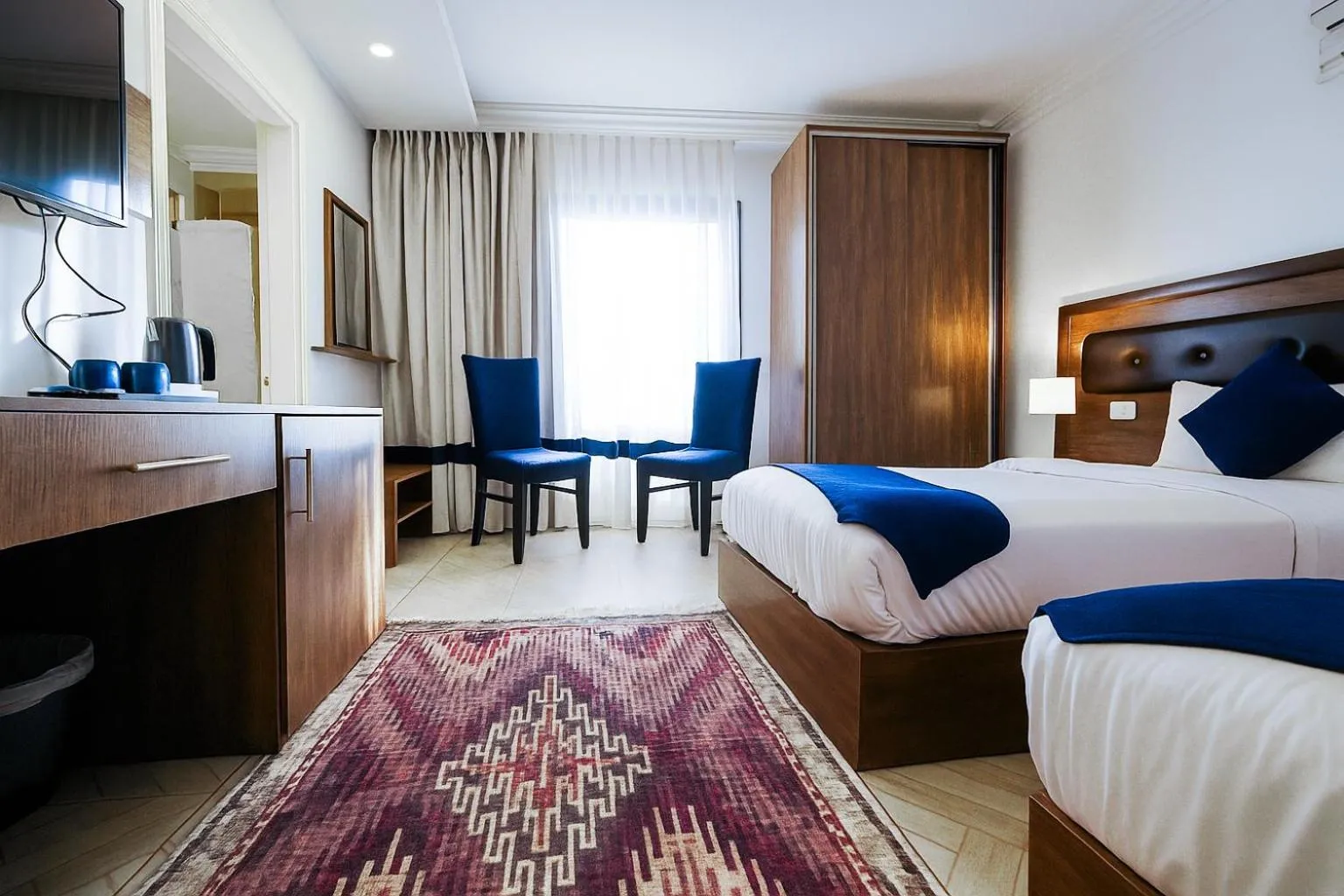 Bed in Corner View Hotel