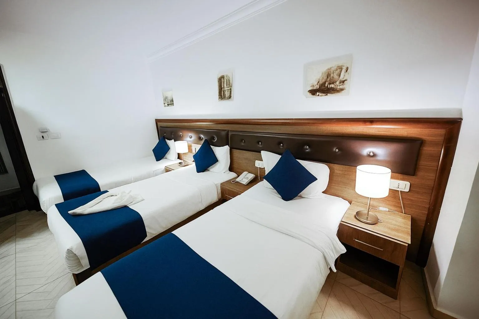 Bed in Corner View Hotel