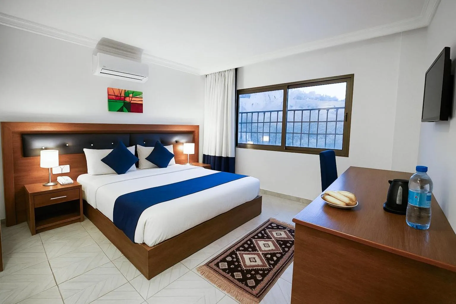 Bed in Corner View Hotel