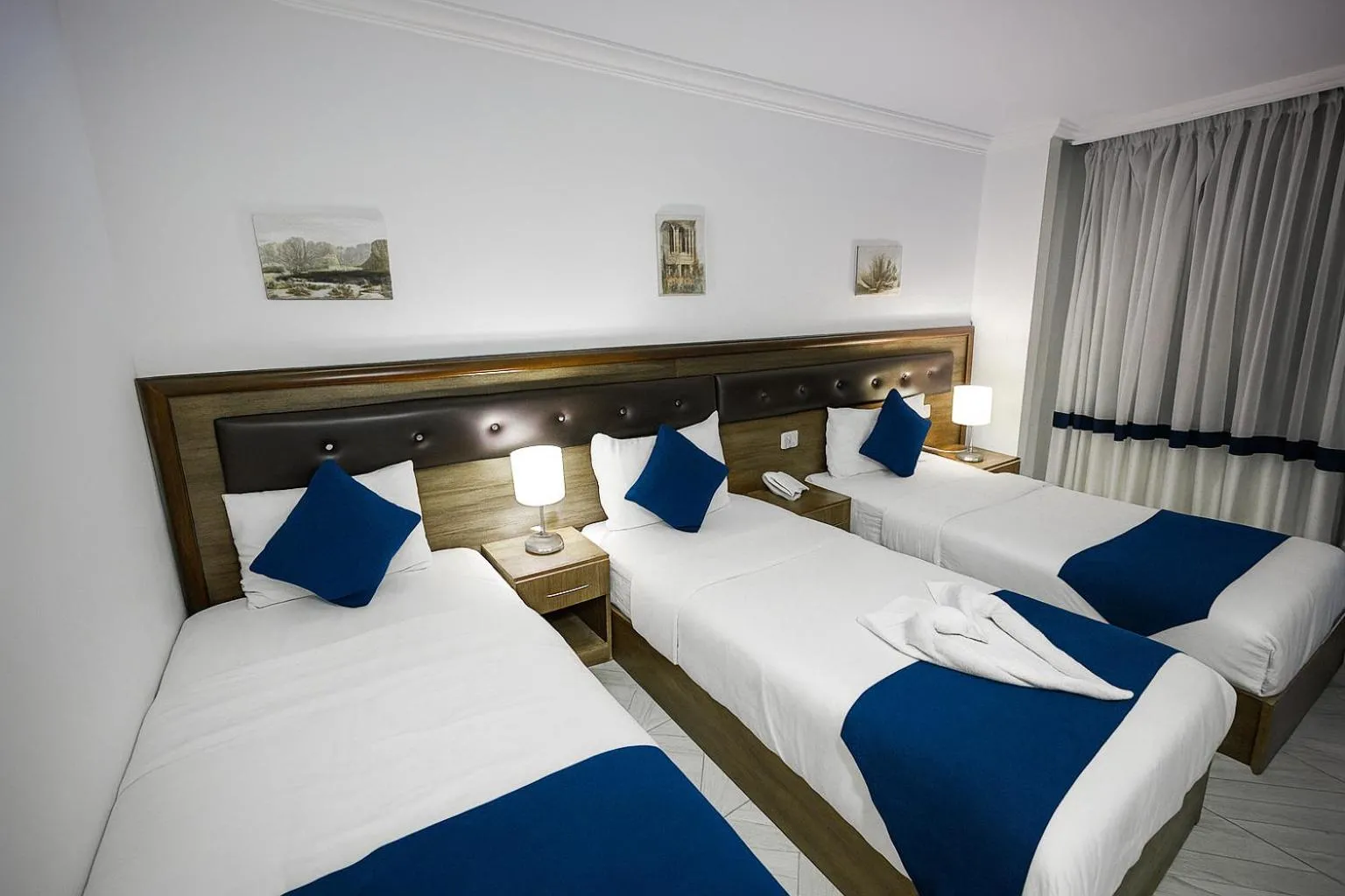Bed in Corner View Hotel