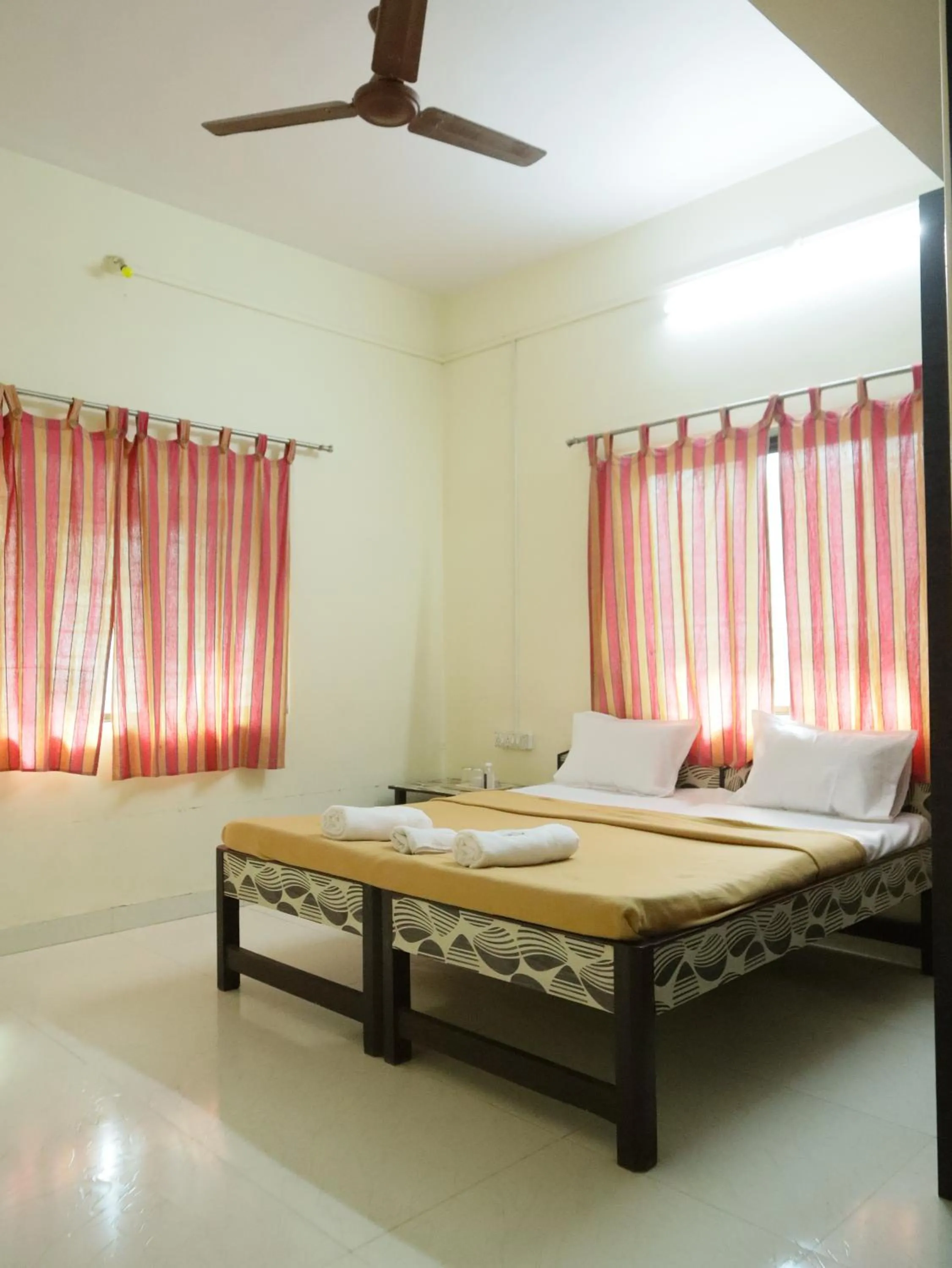 Bed in Hotel sabera residency