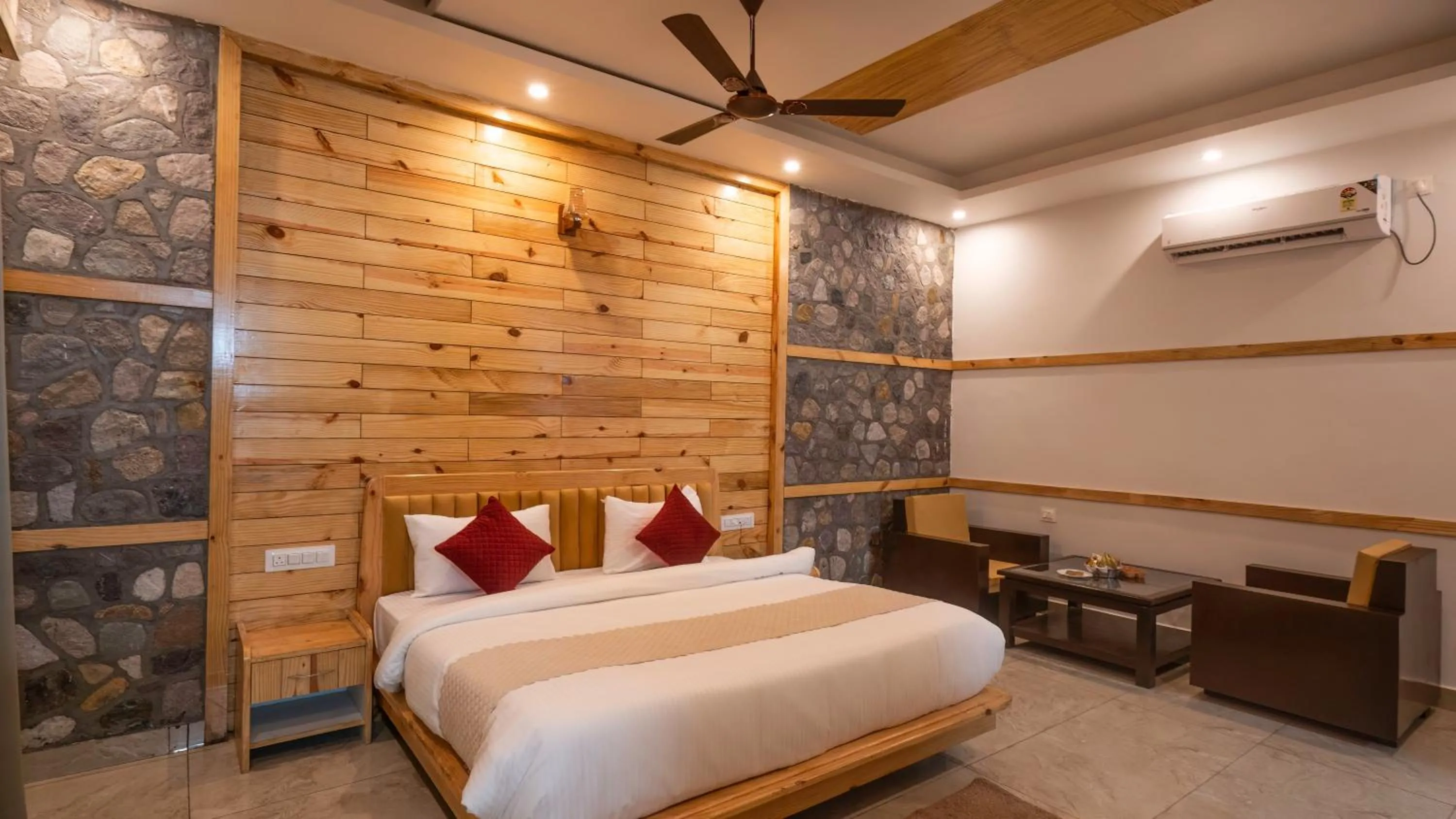 Seating area, Bed in The Forest Resort By 3Tree Group