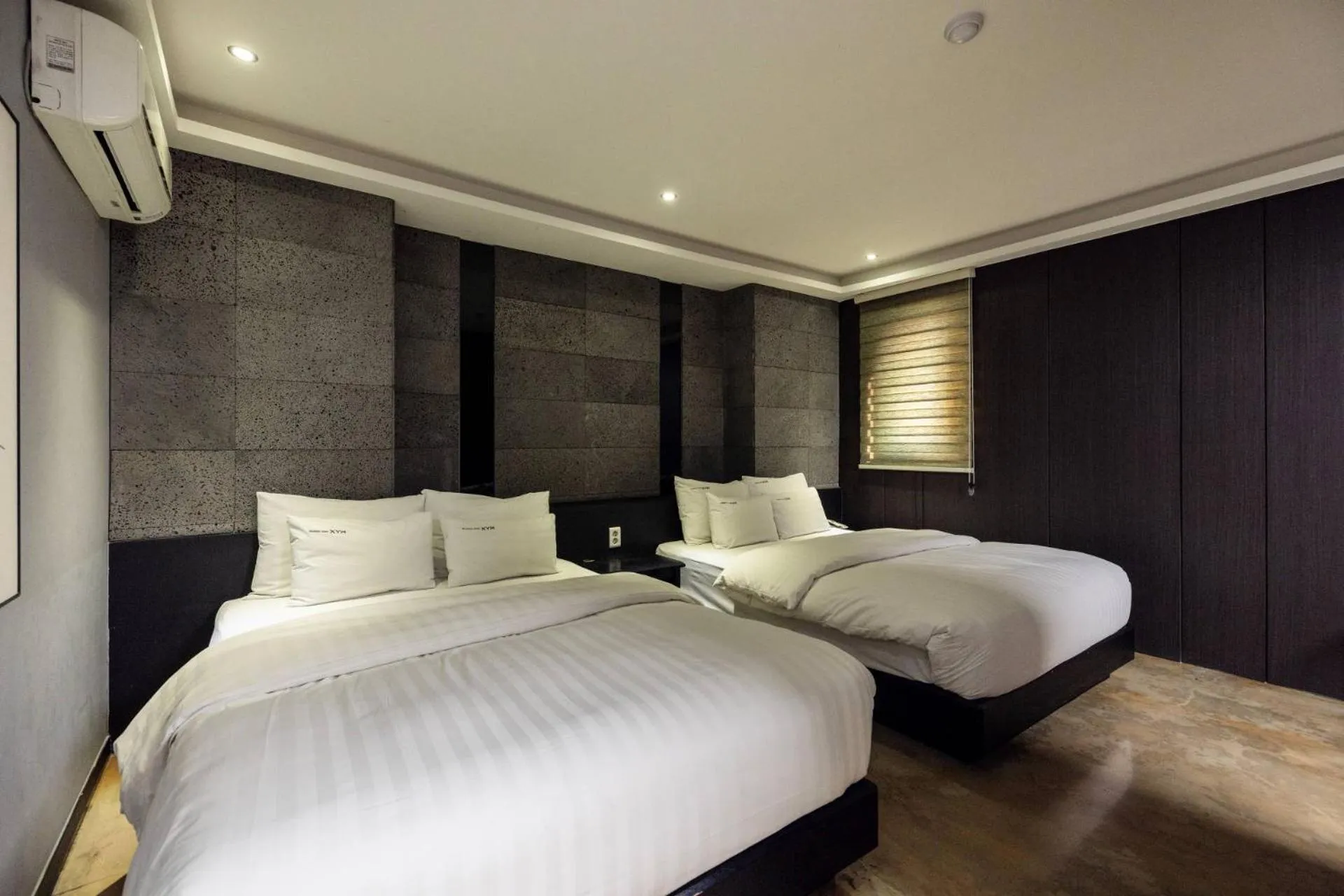 Bed in XYM Hotel Icheon