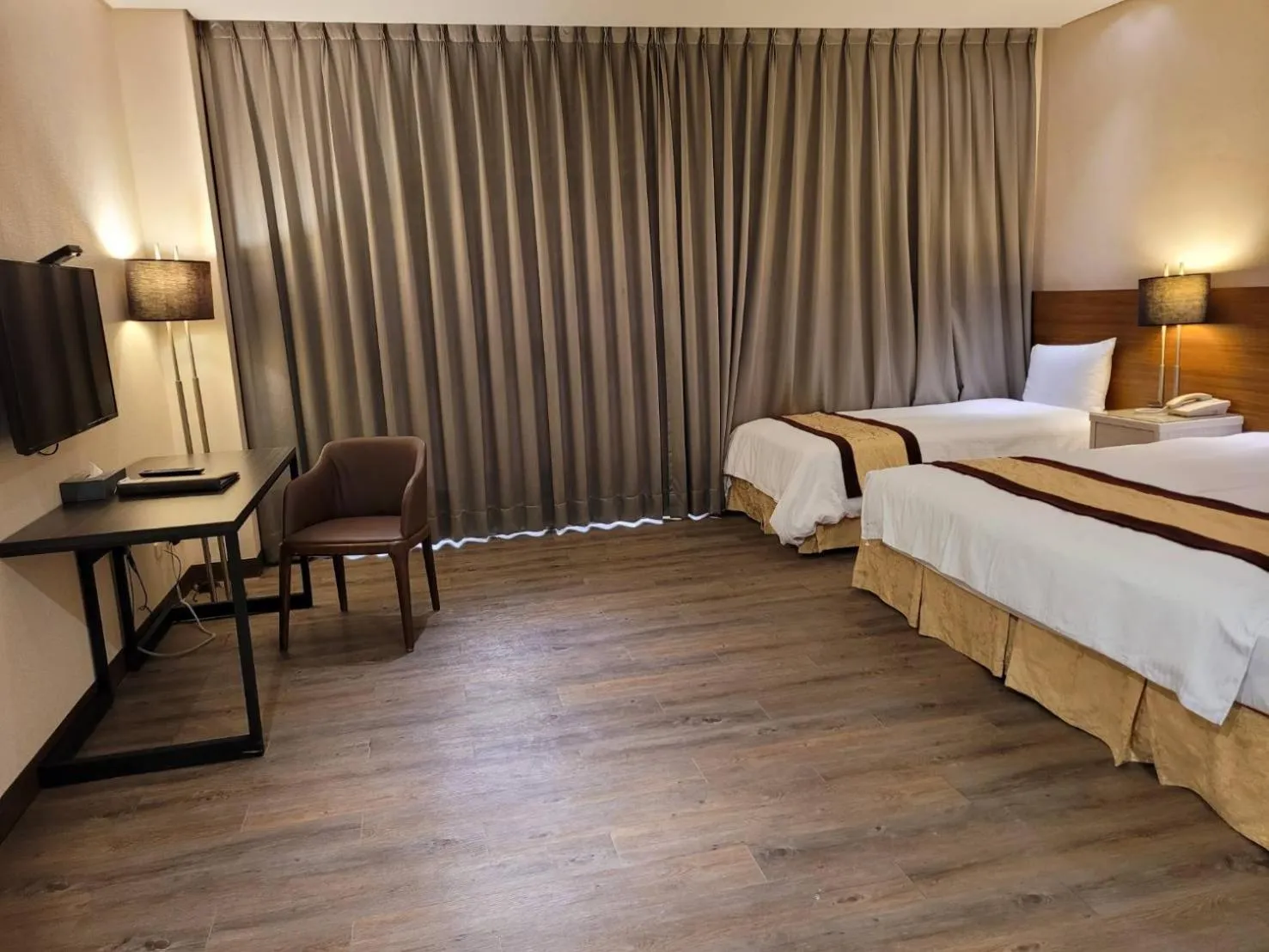 Bed in Sankaikan Hotel