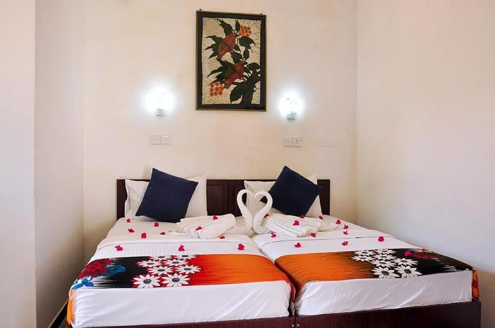 Bed in Sea Breeze Hotel