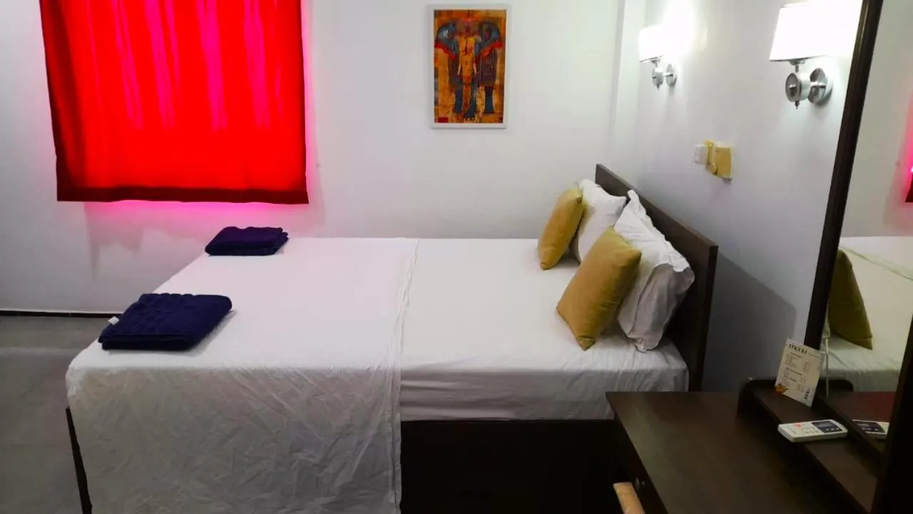 Bed in Sea Breeze Hotel