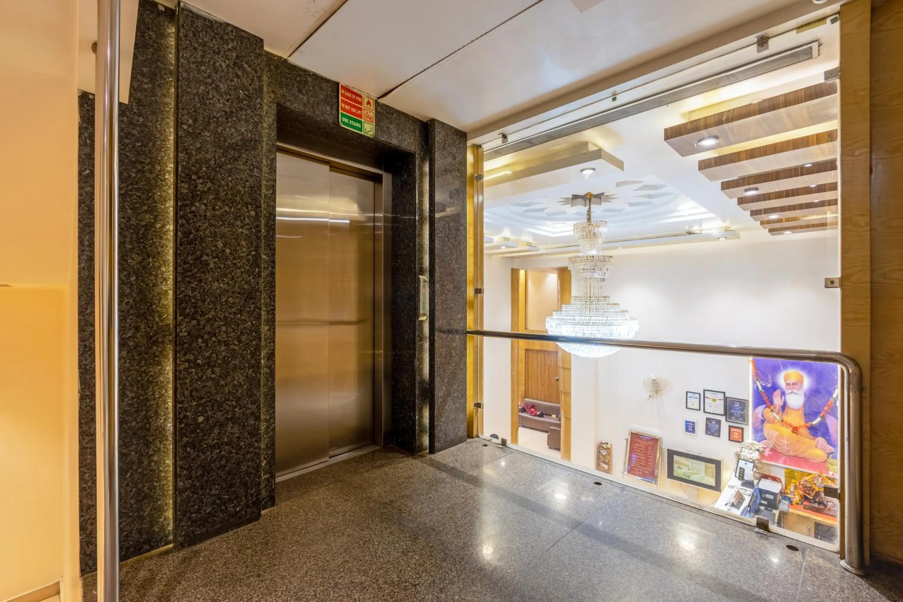 elevator in Aman Continental With Restaurant - 5Mins from Connaught Place ,Railway Station & Metro