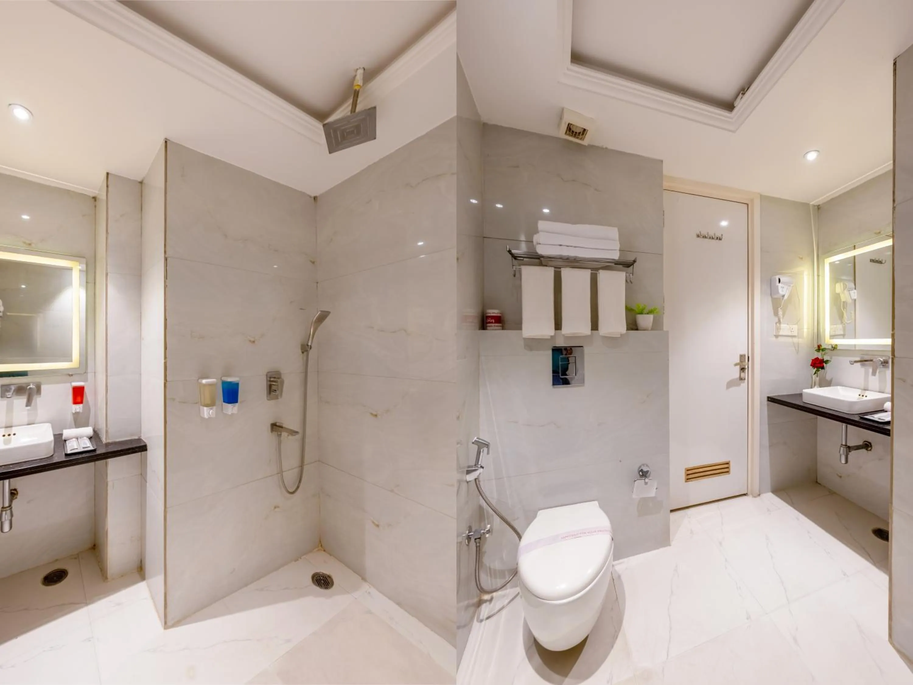 Shower in Aman Continental With Restaurant - 5Mins from Connaught Place ,Railway Station & Metro